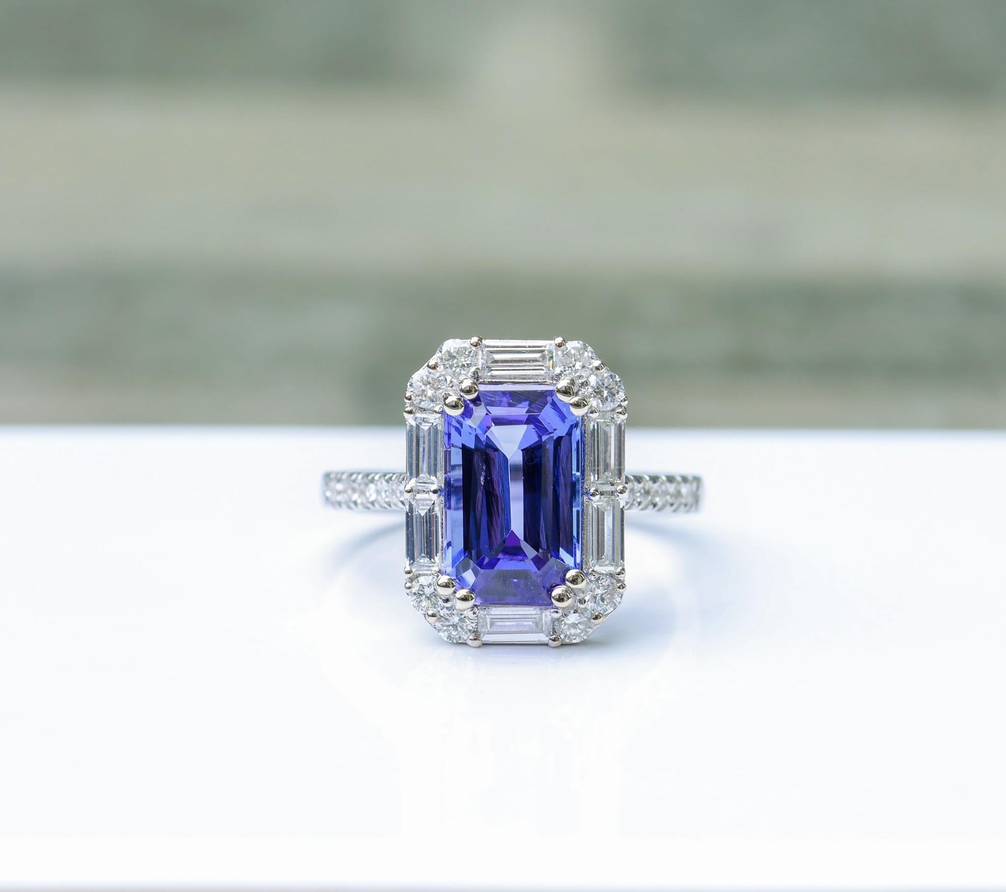 This beautiful ring features a 3.99 carat emerald cut Tanzanite gemstone with natural earth mined diamonds set in solid 14K white gold. This Tanzanite ring makes a lovely December birthstone gift for your loved ones!

Specifications

Item Type: