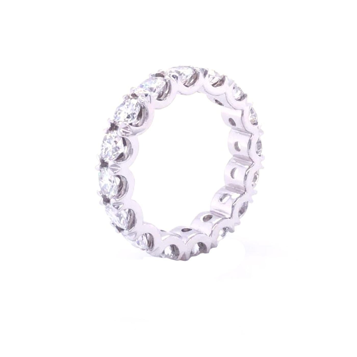 As longstanding symbols of eternal love, eternity bands make a stunning compliment to an engagement ring, anniversary present, and special occasion gift. This u-shape style band is available in 18k White Gold. Platinum Diamond Eternity band,