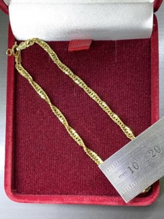 Chaîne torsadée Singapore en or jaune 4 carats