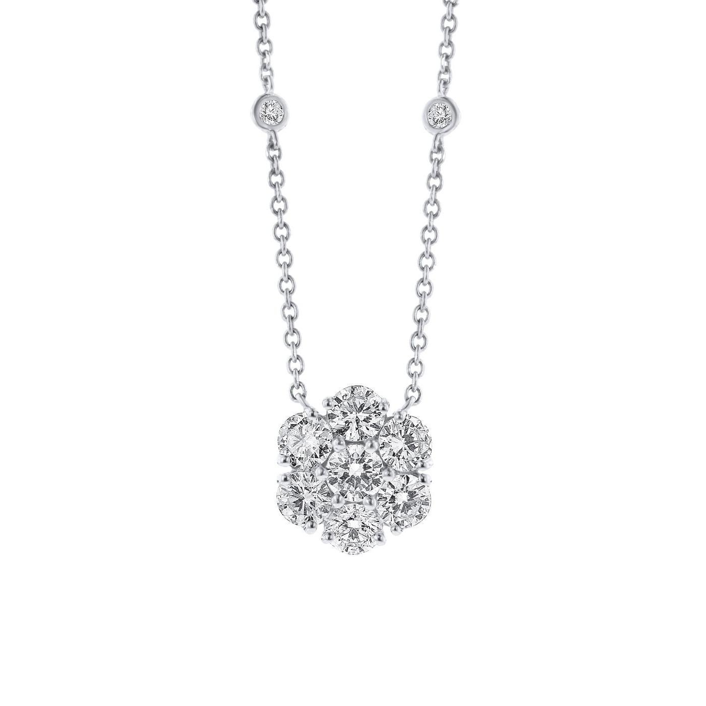 Brimming with style and elegance, this versatile 14K white gold flower necklace is amazing. The piece features a timeless and elegant design. It includes a cluster of diamonds set into a beautiful flower and fixed to the chain to keep it securely in