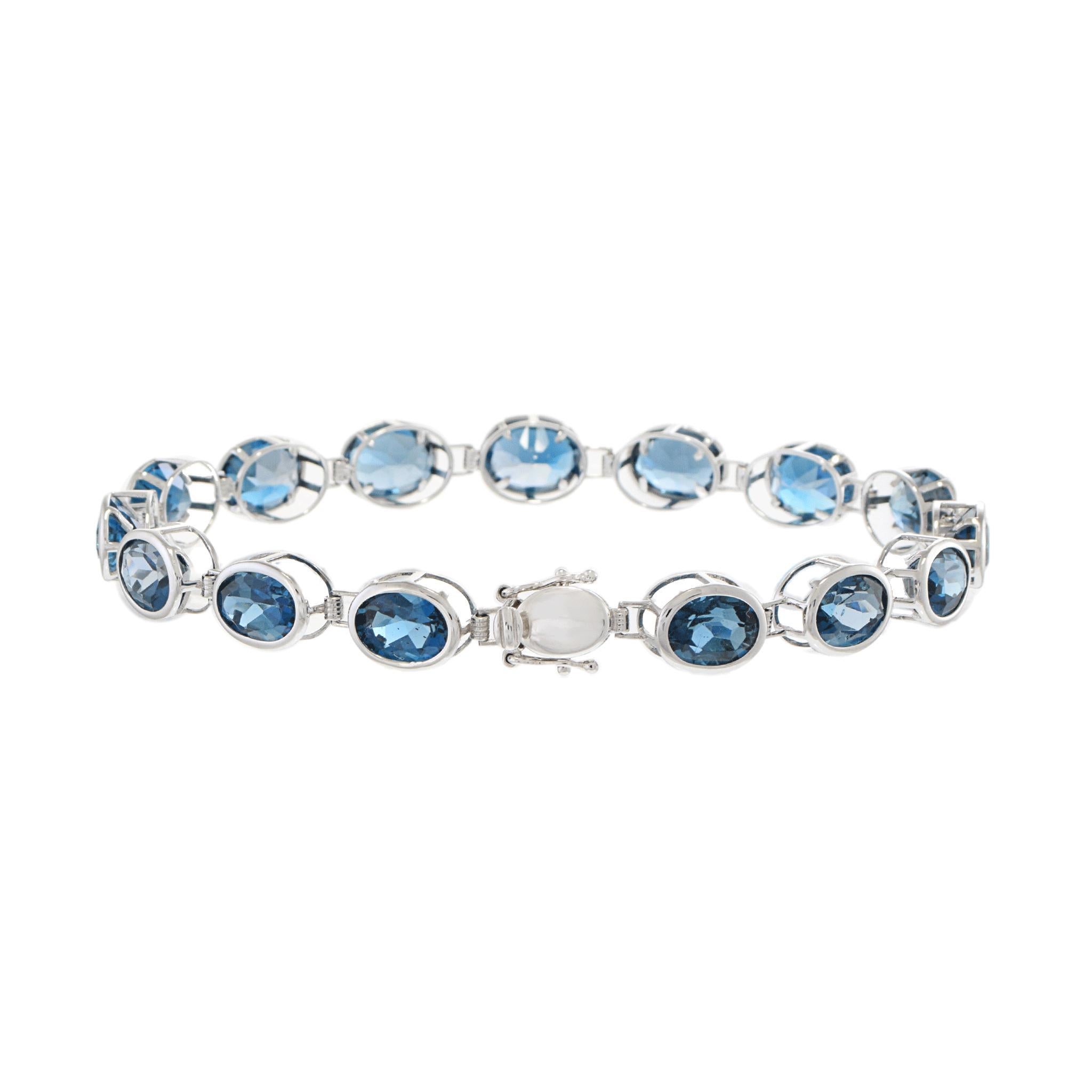Bracelet en or blanc 4KT avec topaze bleue de Londres ovale Neuf - En vente à New York, NY