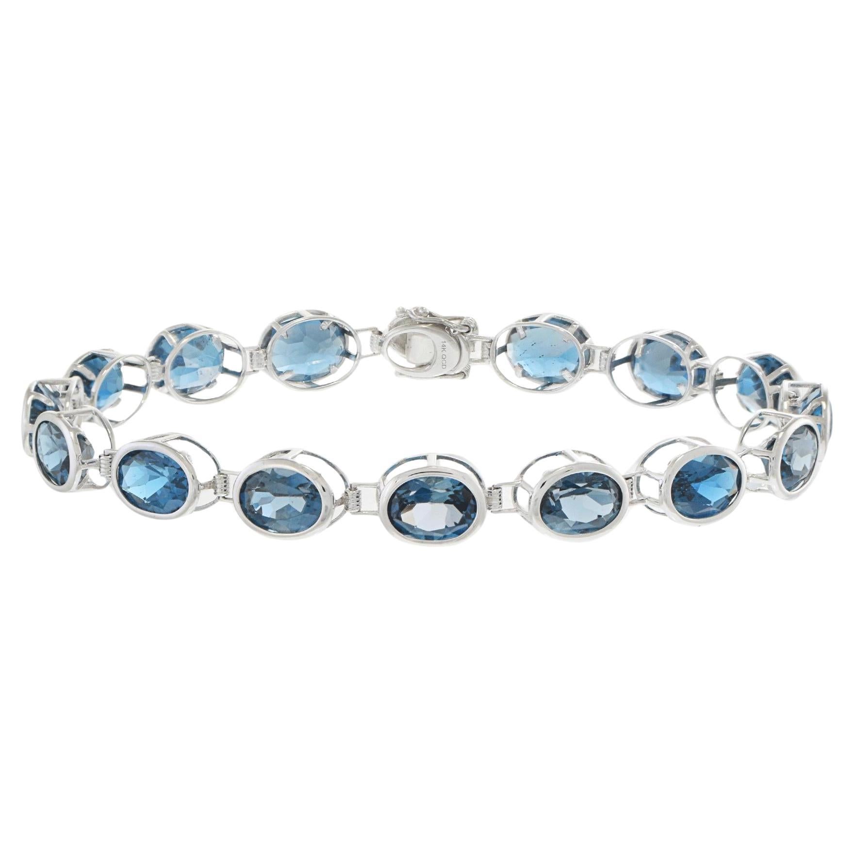 Bracciale in oro bianco 4KT con Topazio Blu di Londra ovale