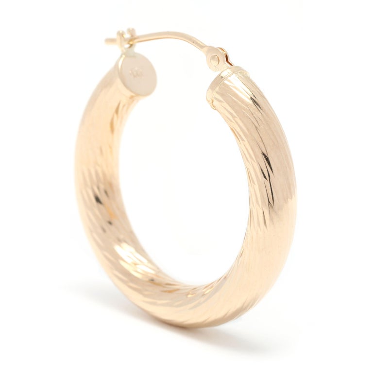 Medium Tapered Gold Hoop Earrings main image 0