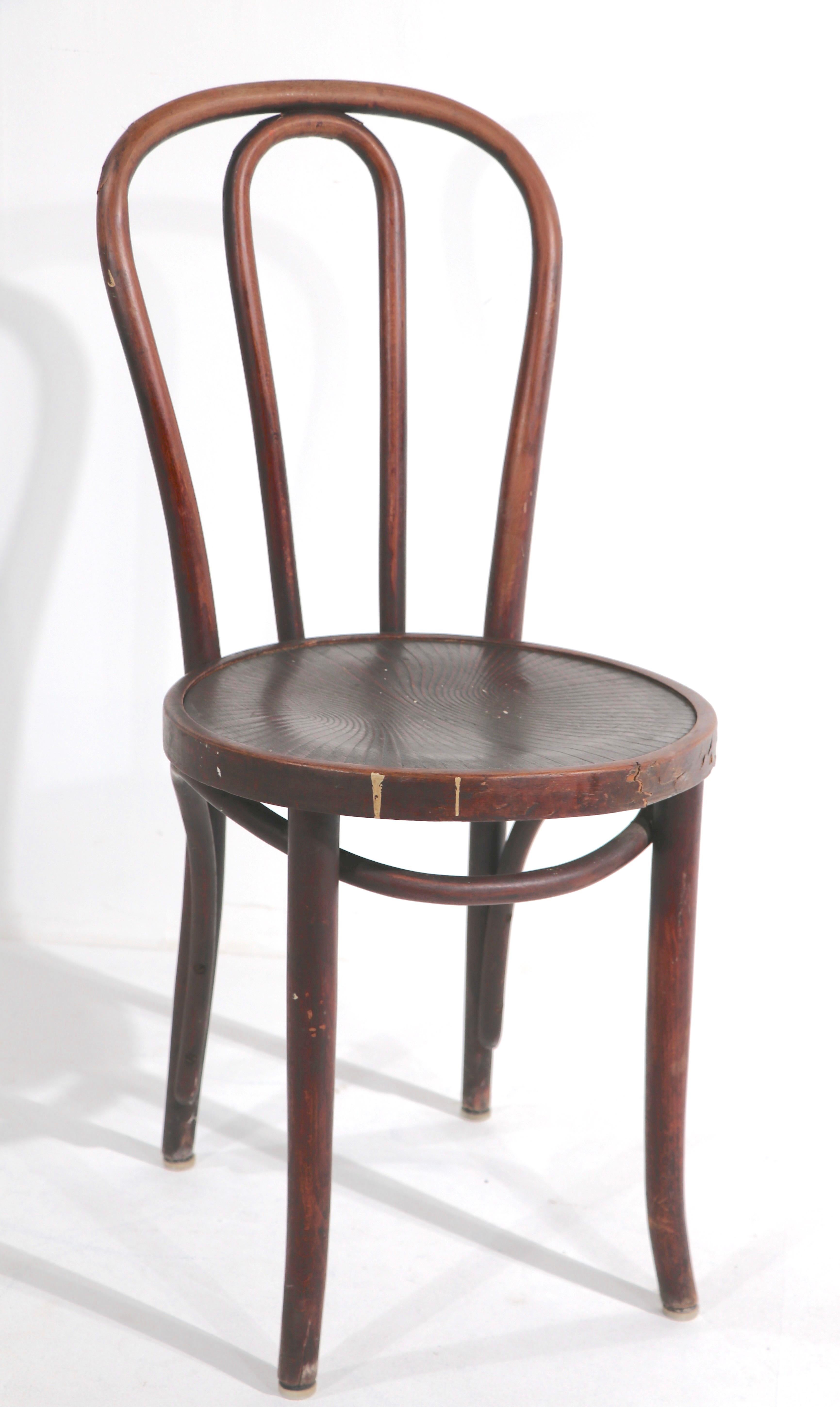Nice set of four antique bentwood dining chairs attributed to Thonet. The chairs are all structurally sound and sturdy, all show cosmetic signs of age and use.
Priced and offered as a set of four.
 