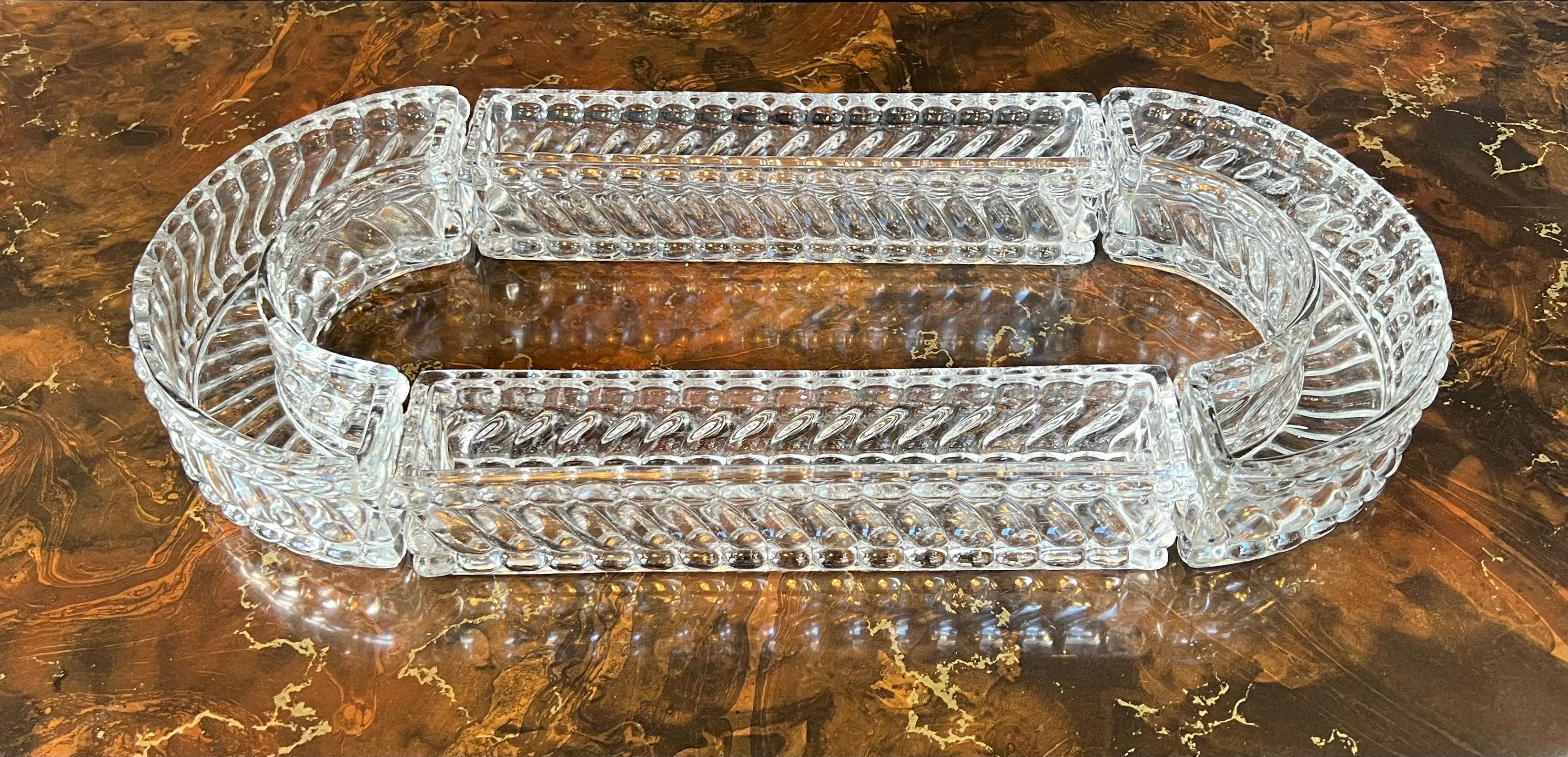 Offer here is a 1930s four piece crystal centerpiece 