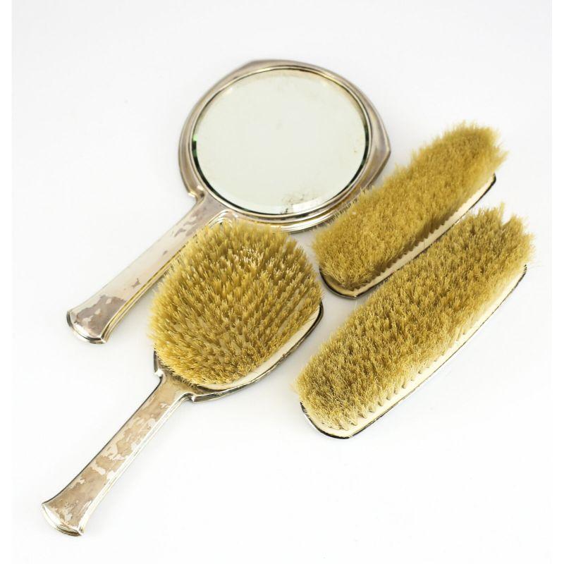 4pc Sterling Silver & Guilloche Enamel Vanity Set by R. Blackinton Co., Brushes

Set Includes;  Hand Mirror, Small Clothes brush, Large Clothes brush, & Hair Brush. This Beautiful set contains off white Guilloche enamel With delicate Pink Rose