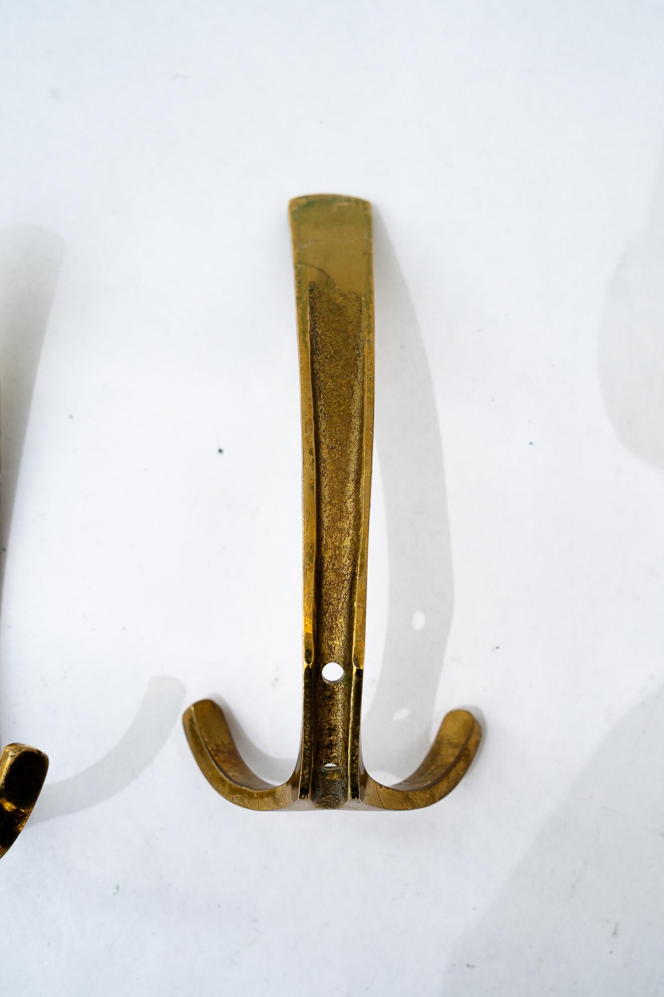 Brass 4x Austrian wall hooks by Hertha Baller, 1950s For Sale