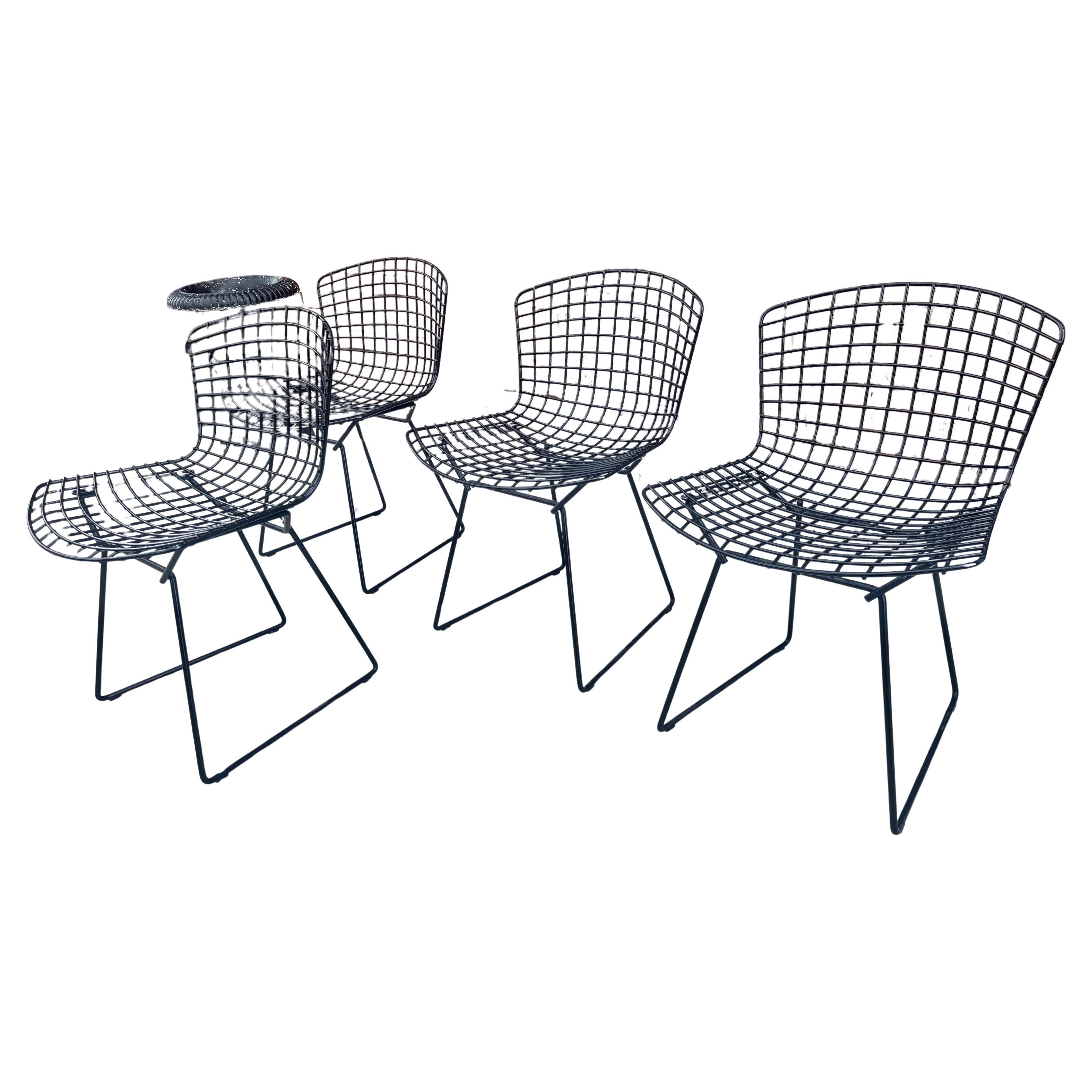 Classic Mid Century mODERN Side chair designed by Harry Bertoia manufactured by Knoll..  Retain they're original rubber coated finish designed to use outside if desired..Have always been used inside,,in amazing almost new condition,, Harry Bertoia's