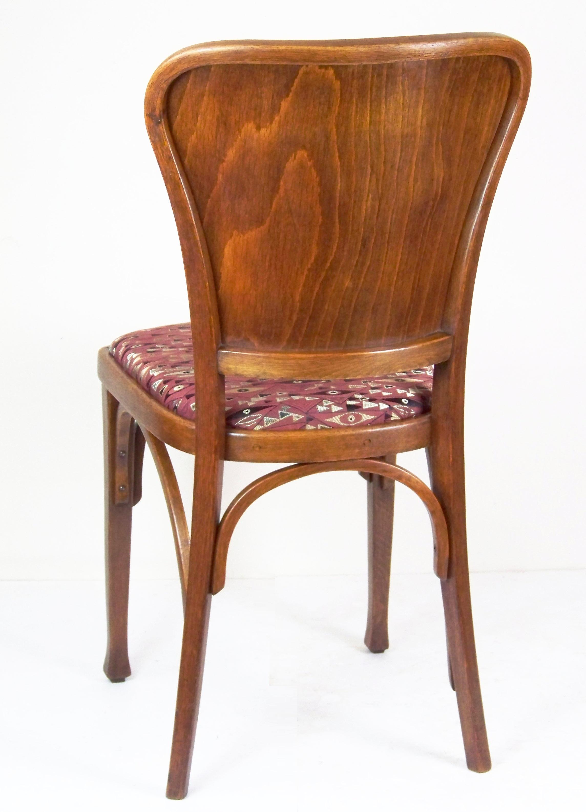 Perfect original condition, really exceptionally well preserved. Only the upholstery is new, with woven decor inspired by Gustav Klimt paintings. The wooden bases were perfectly cleaned and polished with shellac polish. The chair first appeared at