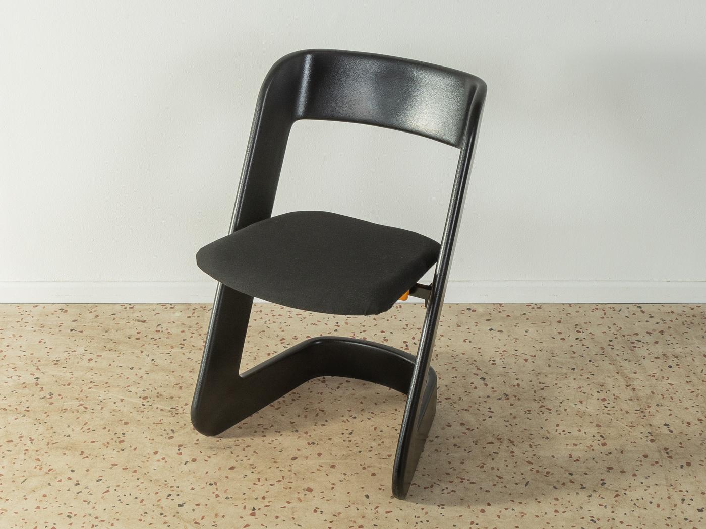 Rare lucy chairs designed by Peter Ghyczy and manufactured by Elastogran GmbH in the 1960s. Curved polyurethane frame with a fold-up plastic seat with a new black upholstery. The offer includes 4 chairs.

Quality Features:
 accomplished design: