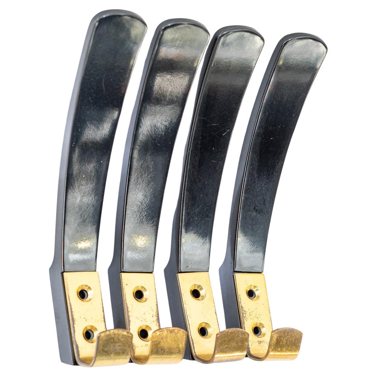 4x Wall Hooks 'Bakelite and Brass', Vienna, circa 1950s