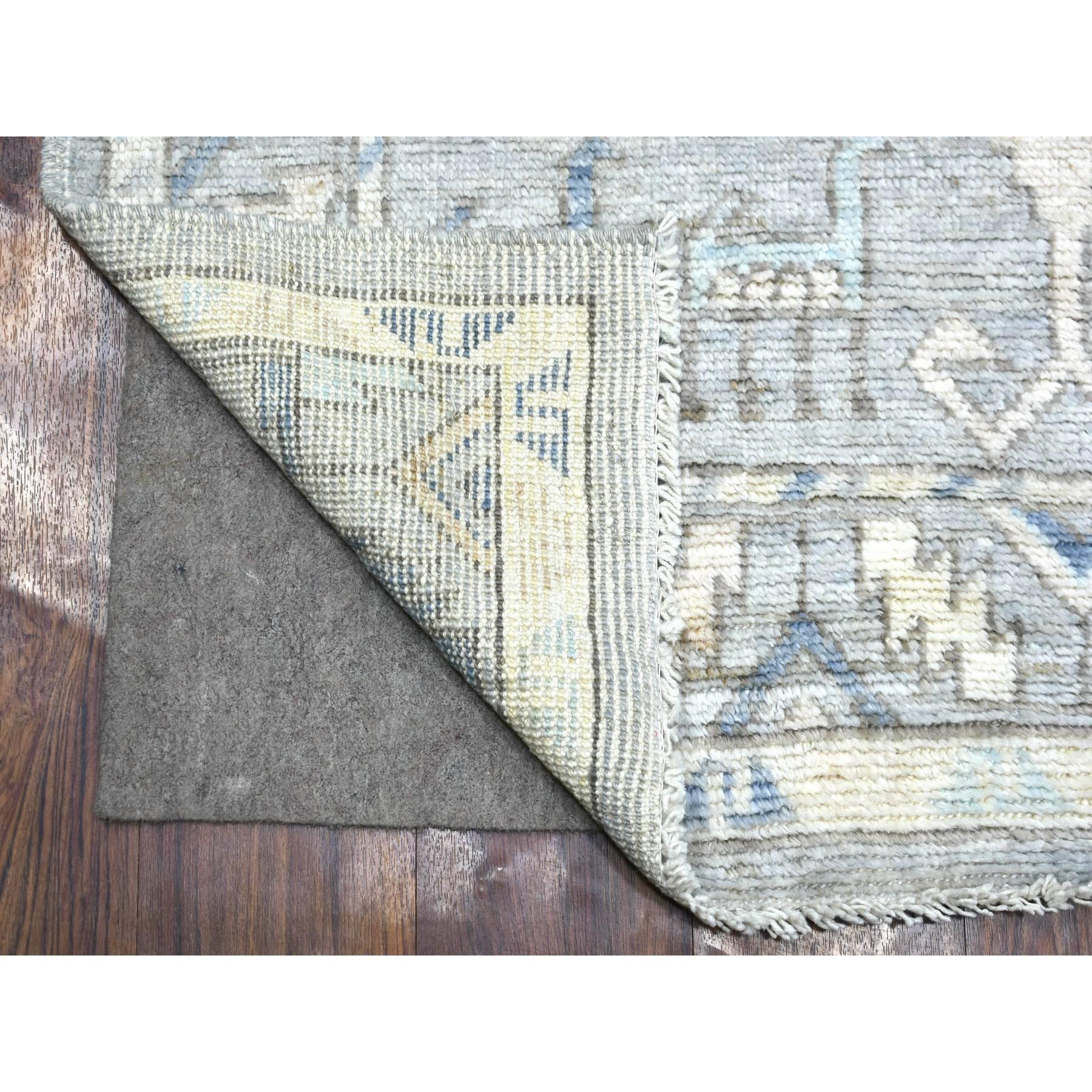 This is a truly genuine one-of-a-kind Light Gray, Soft Wool Hand Knotted, Anatolian Village Inspired Geometric Medallion Design with Animal Figurines Natural Dyes, Wide Runner Oriental Rug. It has been Knotted for months and months in the