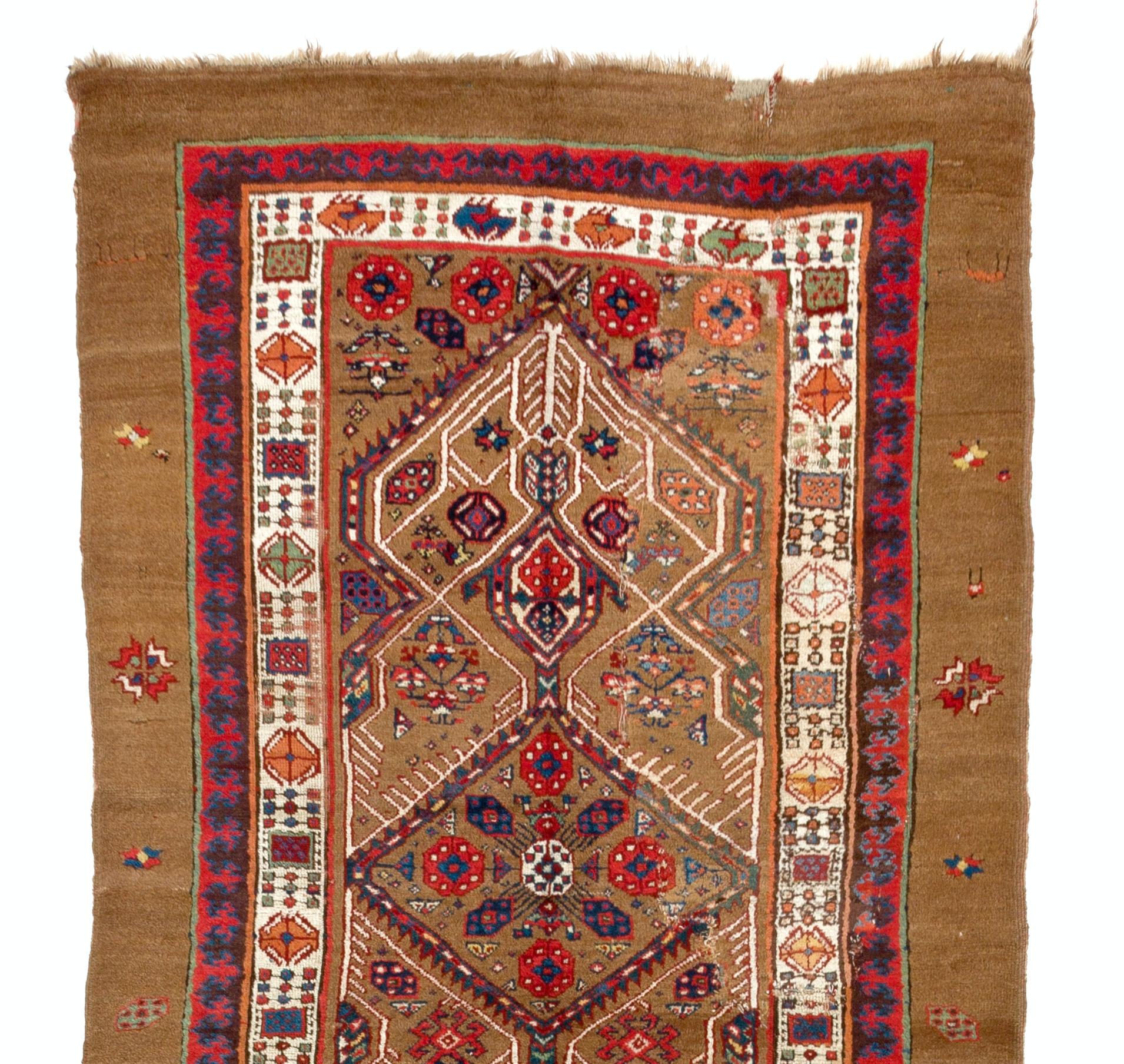 An antique Serab camel hair runner rug, Northwest Persian. Finely hand-knotted with even medium wool pile on wool foundation. Very good condition. Sturdy and as clean as a brand new rug (deep washed professionally).
Size: 4 x 12.4 ft.