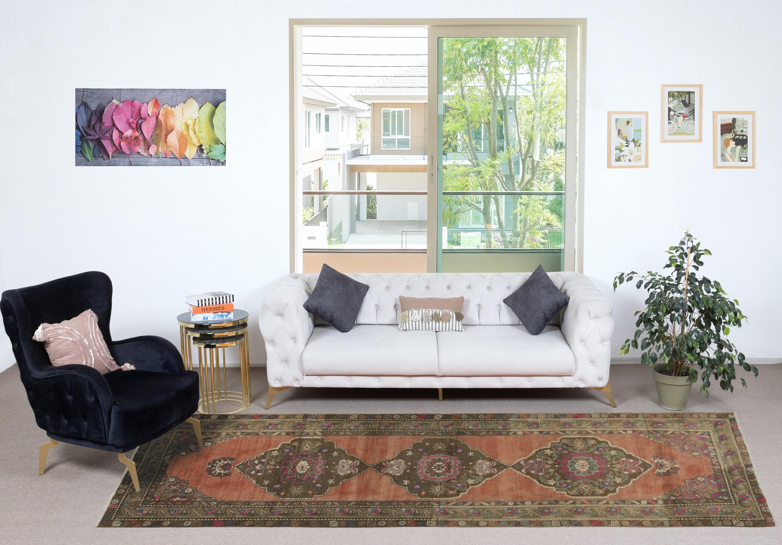 Enhance your home with the authentic charm of this vintage handknotted Turkish wool runner rug, a masterpiece of traditional Anatolian craftsmanship. 

Crafted from 100% high-quality wool, this runner rug offers exceptional durability, warmth, and a