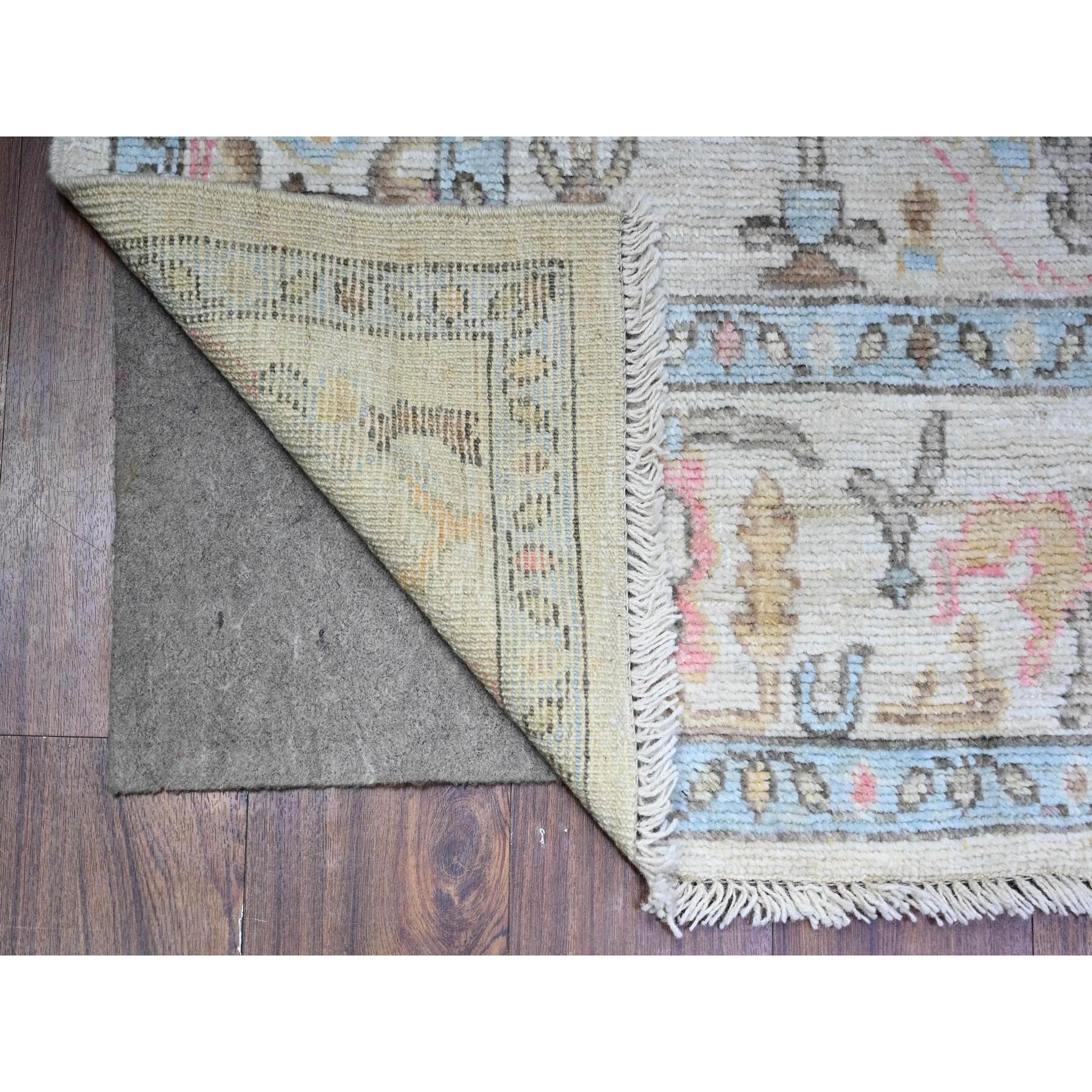 Cashmere Gray, Hand Knotted Vegetable Dyes Afghan Angora Oushak All Over Pattern, 100% Wool Wide Runner Oriental Rug
Primary materials: Wool
Latex: No Pile 
height: 0.25 Inches
Style: Transitional
Primary color: Grey
Secondary colors: Pink, Orange,