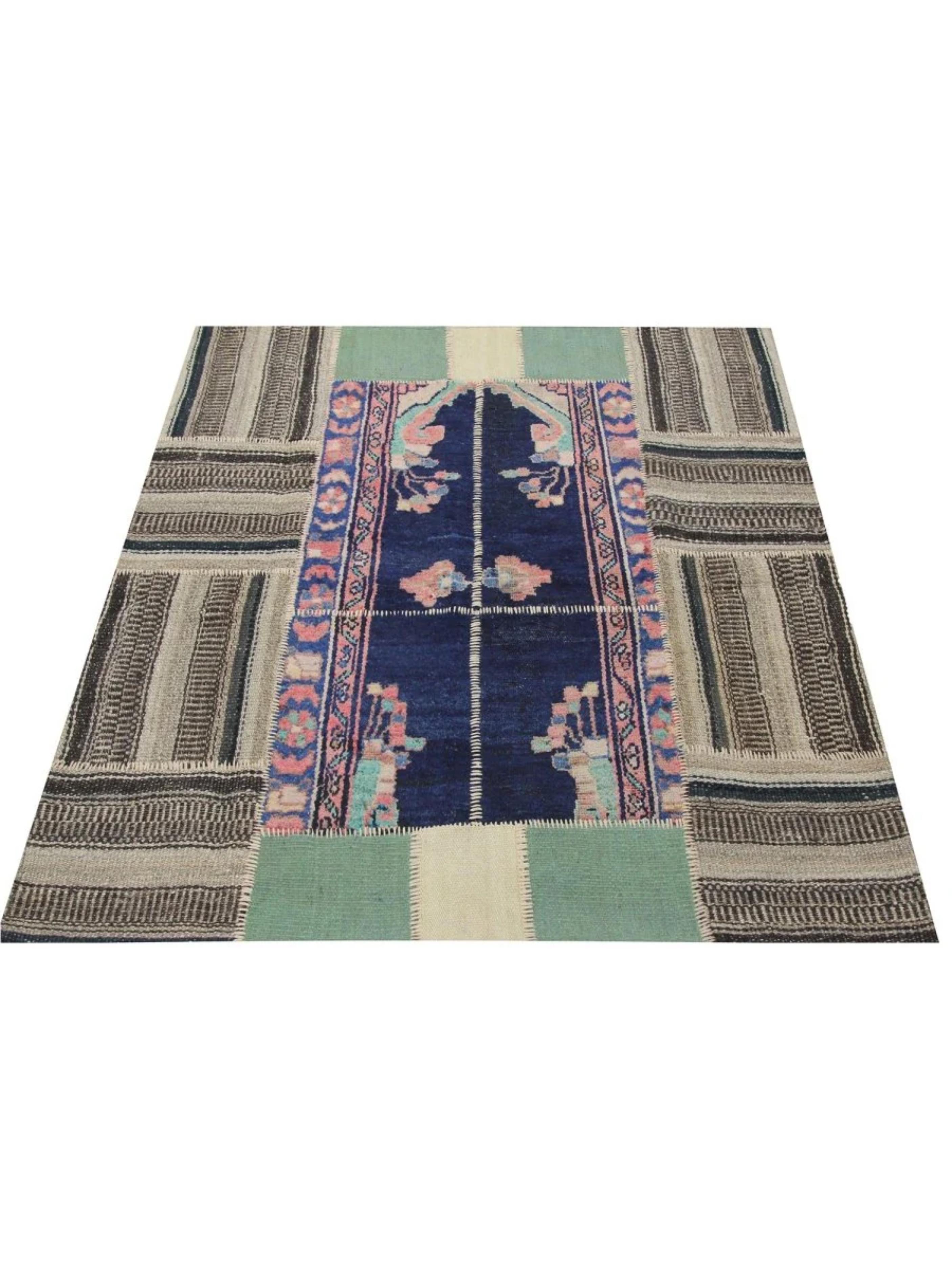 Transform your space with the 4x5 Vintage Kilim Patchwork Area Rug, a one-of-a-kind piece that brings warmth, character, and timeless style to any space. Handcrafted from premium wool, this exquisite rug showcases a geometric patchwork design, where