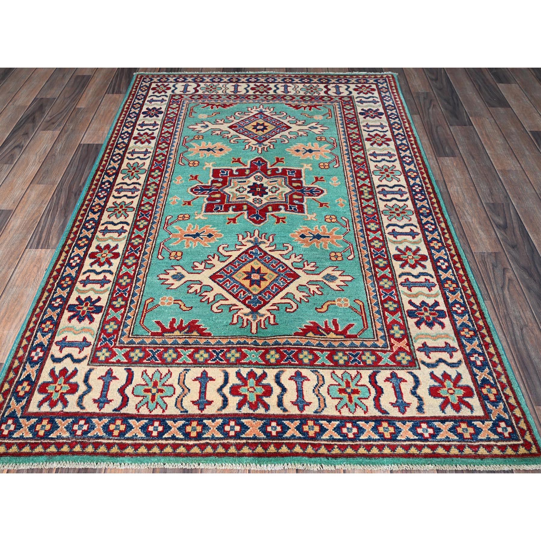 Aqua Green, Kazak with Tribal Medallions Design, Vegetable Dyes, Denser Weave, Soft and Vibrant Wool, Hand Knotted, Oriental Rug
Primary materials: Wool
Latex: No Pile 
height: 0.25 Inches
Style: Traditional
Primary color: Green
Secondary colors: