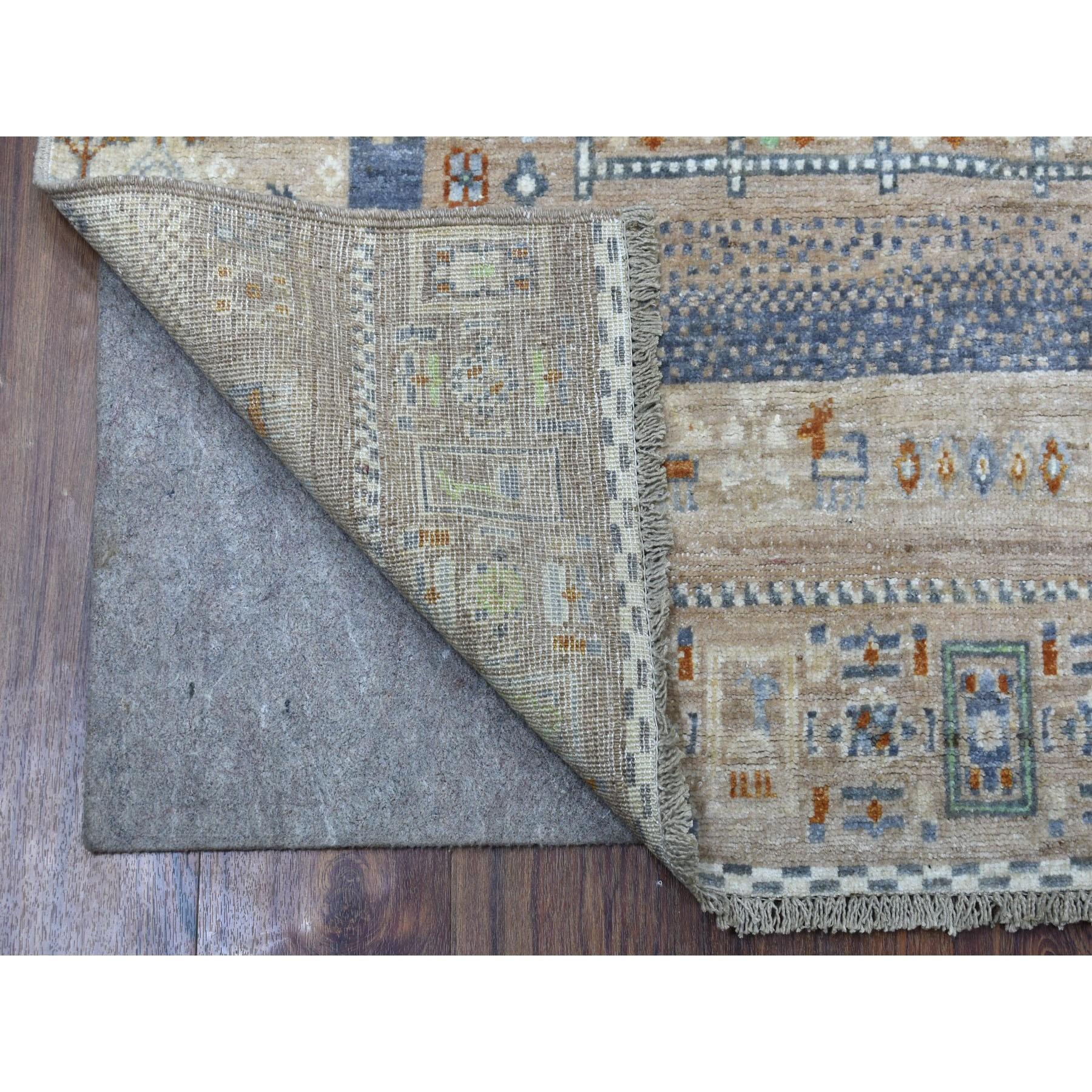 This is a truly genuine one-of-a-kind Brown Natural Wool Kashkuli Gabbeh With Small Animal Figurines Hand-Knotted Ethnic Rug. It has been Knotted for months and months in the centuries-old weaving craftsmanship techniques by expert artisans.
Primary