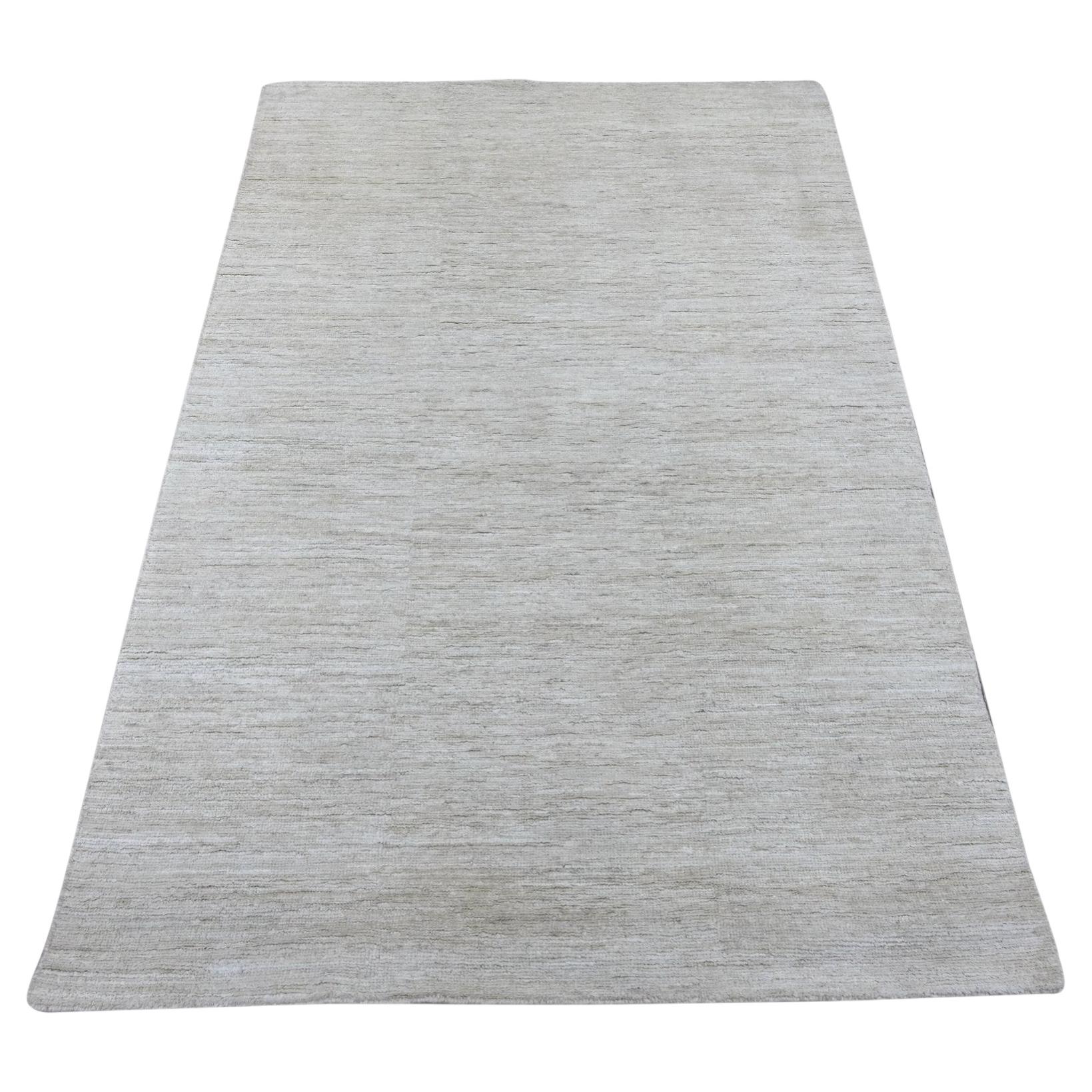 4'x5'10" Ivory Plain Solid Pattern Hand Knotted Hand Spun Ghazni Wool Rug