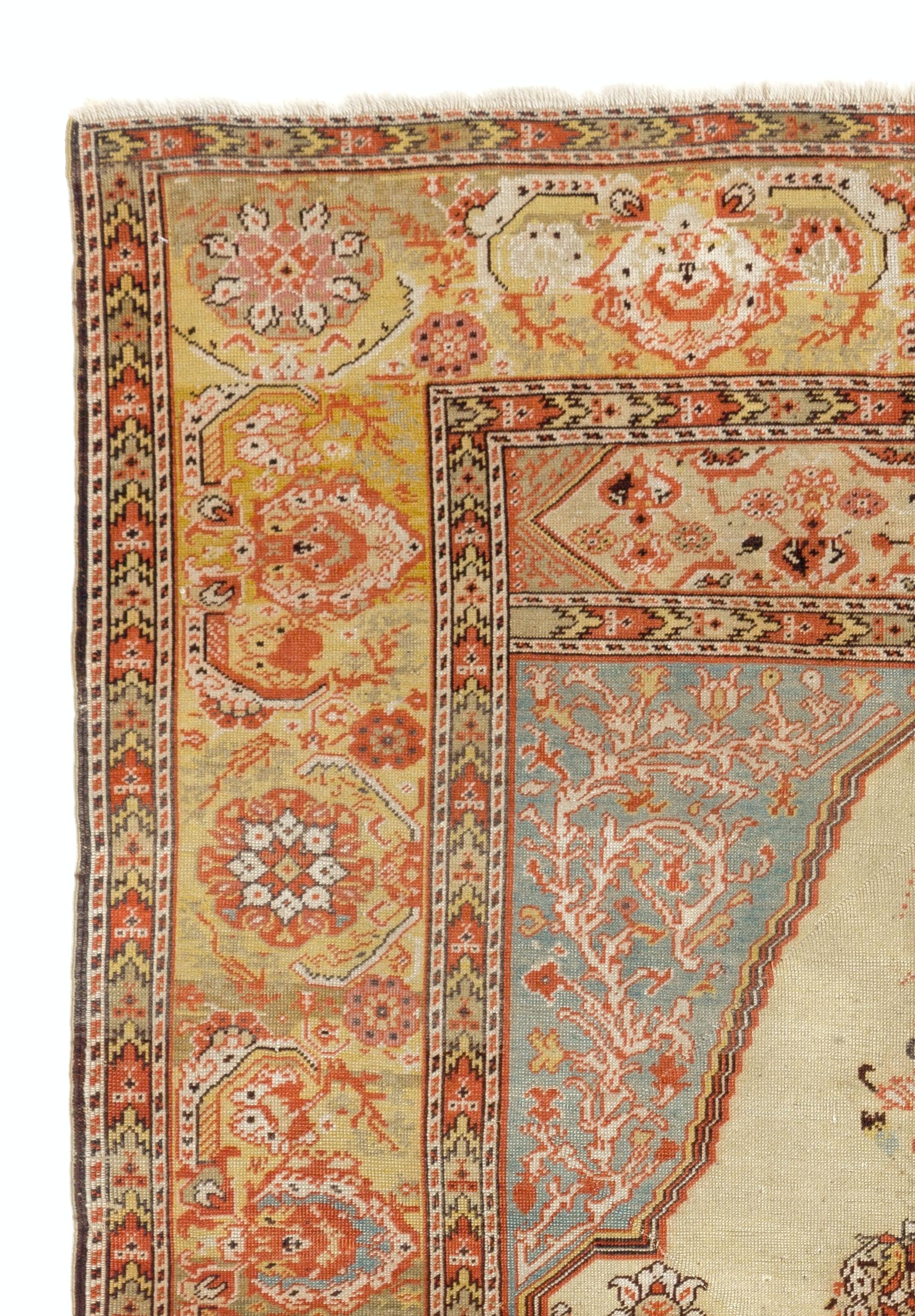 An antique Turkish Ghiordes prayer rug hand-knotted in 1880s in Gordes of Western Turkey, which was once a famous rug making centre with its own well-defined classical aesthetic. 

This elegant Ghiordes prayer rug is part of the same tradition of