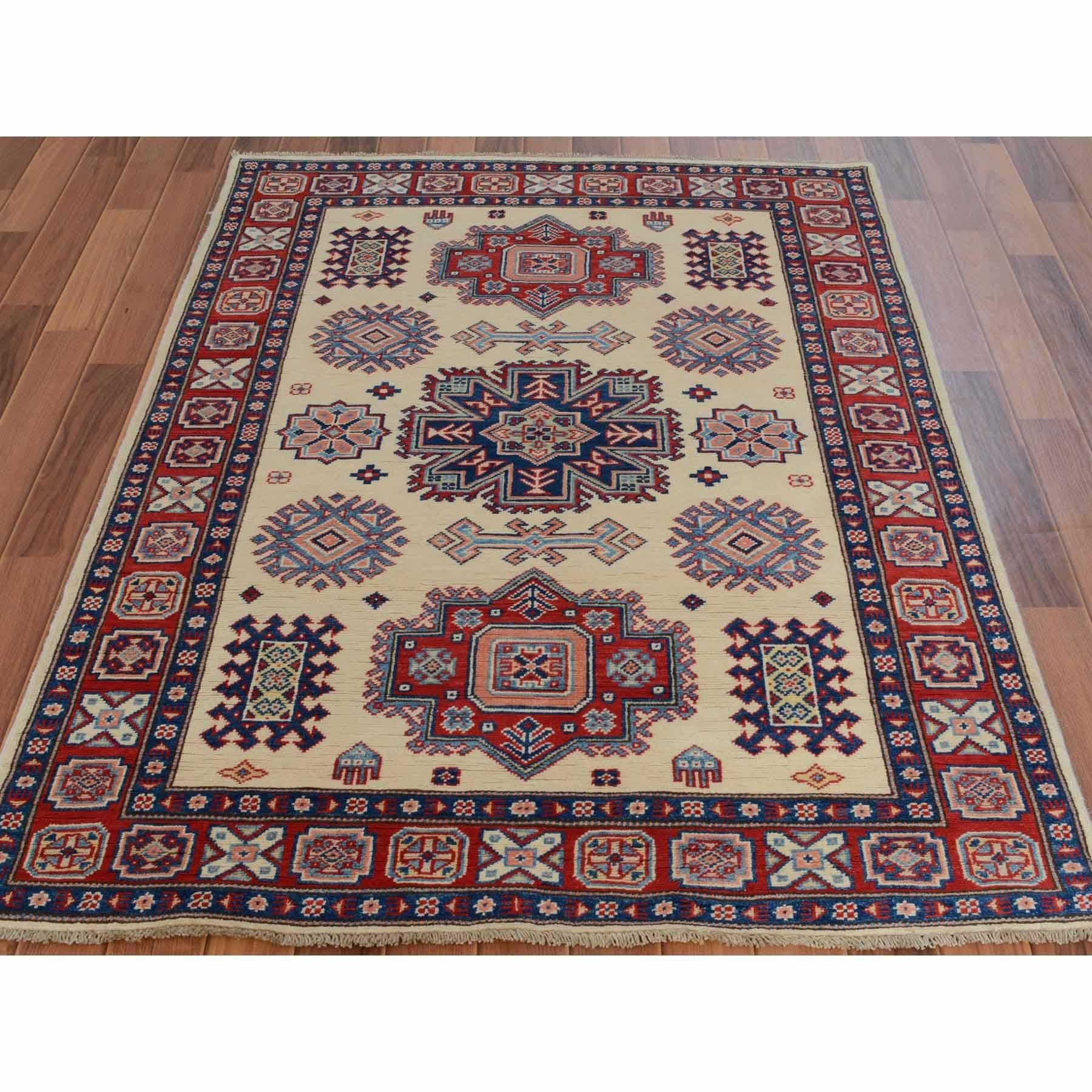 This is a truly genuine one-of-a-kind Ivory Special Kazak Tribal Design Pure Wool Hand Knotted Oriental Rug. It has been woven for months and months in the centuries-old Persian weaving craftsmanship techniques by expert artisans.
Primary materials: