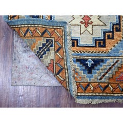 Tappeto afghano Ersari blu con disegno di piedi di elefante annodato a mano, interamente in lana.