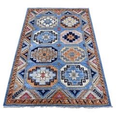 Tappeto afghano Ersari blu con disegno di piedi di elefante annodato a mano, interamente in lana.