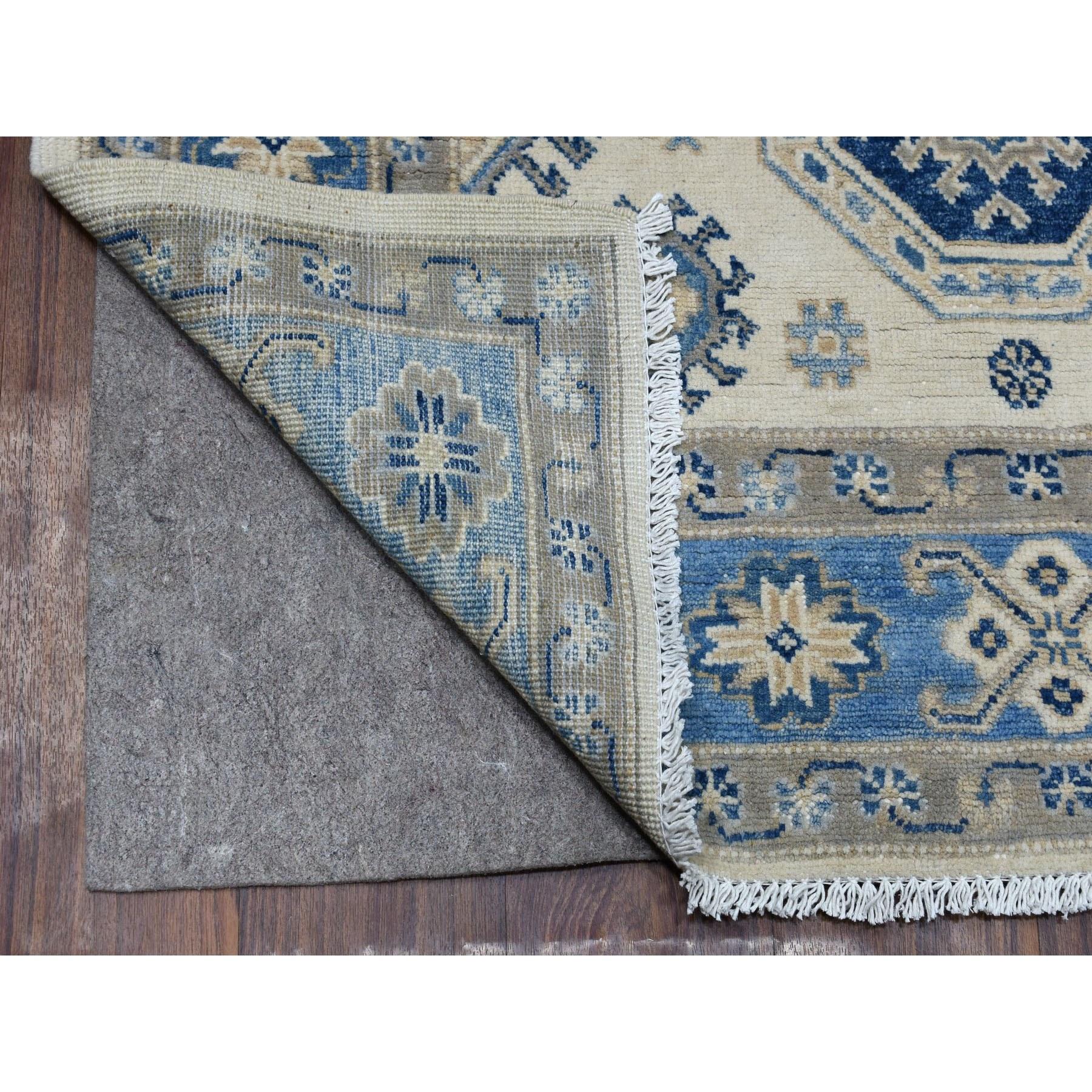 This is a truly genuine one-of-a-kind Ivory Afghani Wool Vintage Look Kazak Hand Knotted Oriental Rug. It has been woven for months and months in the centuries-old Persian weaving craftsmanship techniques by expert artisan
Primary materials: