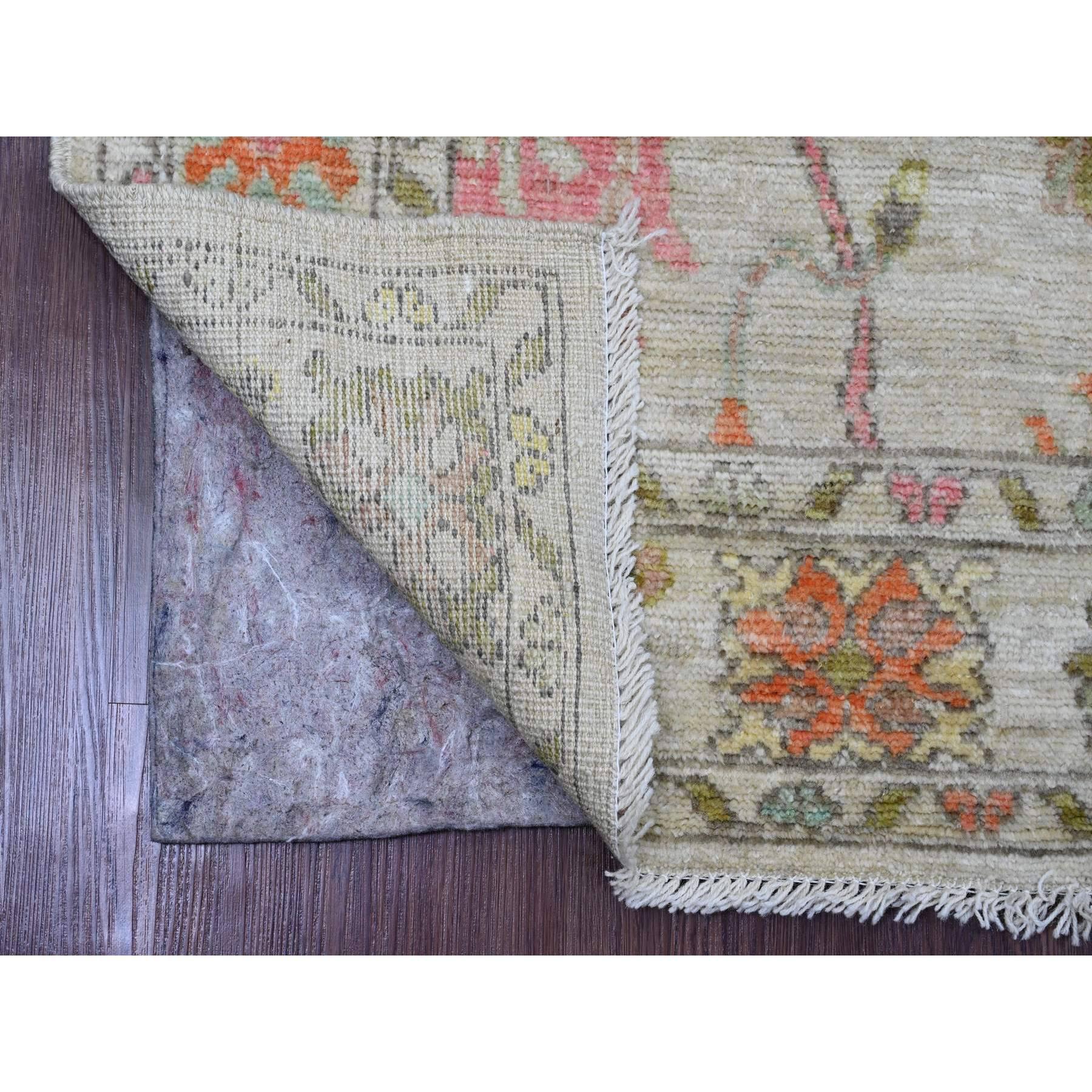 Chiffon White, Afghan Angora Oushak with Colorful Leaf Pattern, Hand Knotted, Vegetable Dyes, 100% Wool, Oriental Rug
Primary materials: Wool
Latex: No Pile 
height: 0.25 Inches
Style: Transitional
Primary color: Ivory
Secondary colors: Pink,