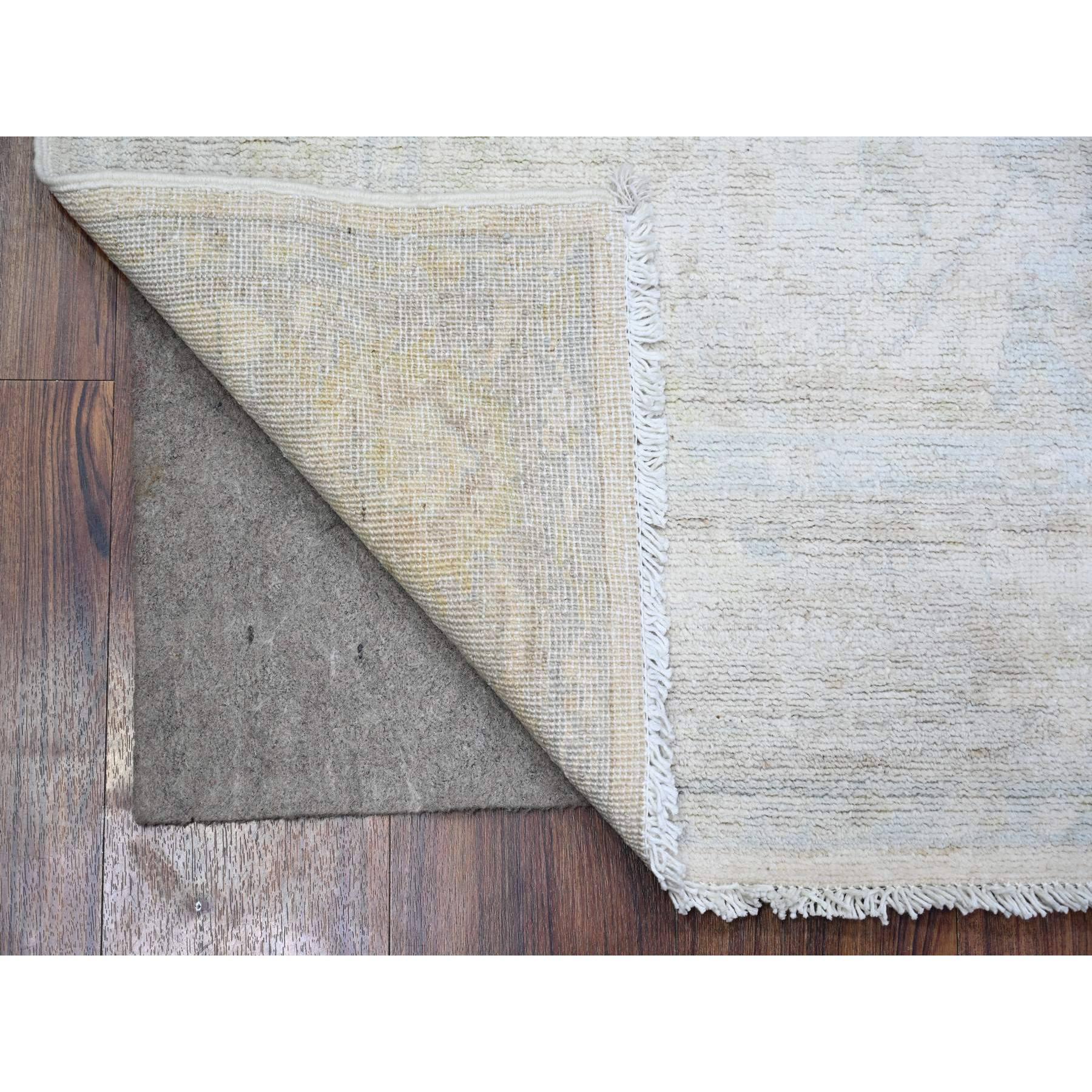 White Wash Peshawar with Faded Design, Natural Dyes, Pure Wool, Hand Knotted, Oriental Rug
Primary materials: Wool
Latex: No Pile 
height: 0.25 Inches
Style: Transitional
Primary color: Ivory
Secondary colors: Beige, Brown
Pattern: Oriental