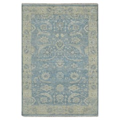 Alfombra de Pelo Cero Anudada a Mano con Diseño de Hojas de Hoz de Lana Pura Azul de 4
x6
 Beau