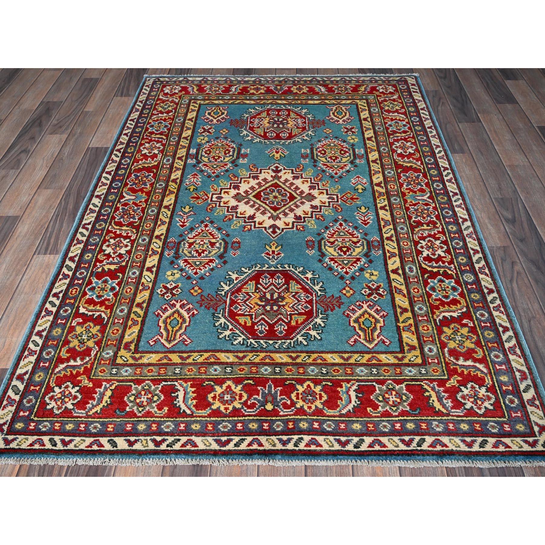 Aquamarine Blue, Kazak with Geometric Medallions Design, Vegetable Dyes, Denser Weave, Hand Knotted, Soft and Vibrant Wool, Oriental Rug
Primary materials: Wool
Latex: No Pile 
height: 0.25 Inches
Style: Traditional
Primary color: Blue
Secondary