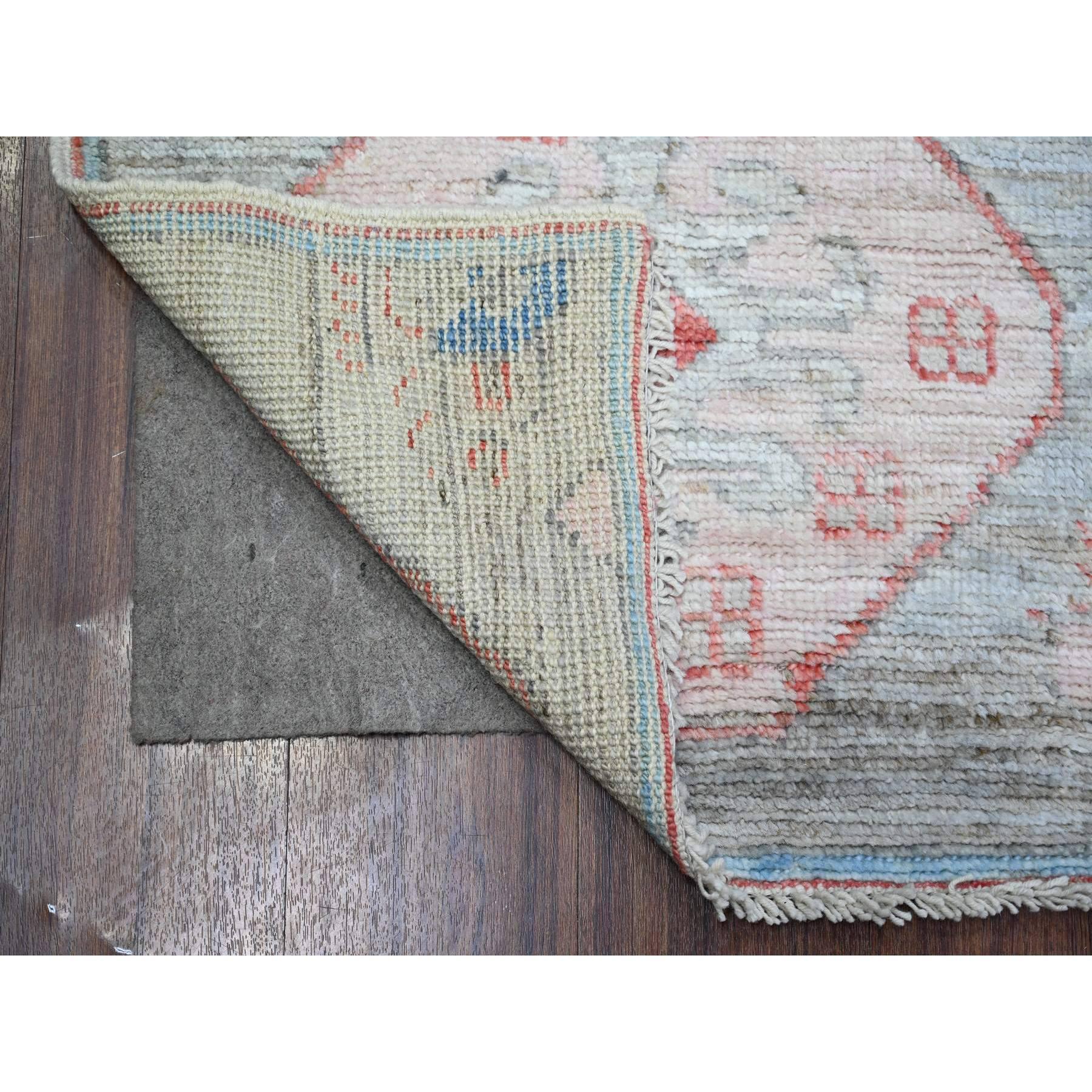 Cloud Blue, Vegetable Dyes 100% Wool, Hand Knotted Anatolian Village Inspired Geometric Medallions with Animal Figurines, Oriental Rug
Primary materials: Wool
Latex: No Pile 
height: 0.25 Inches
Style: Traditional
Primary color: Blue
Secondary