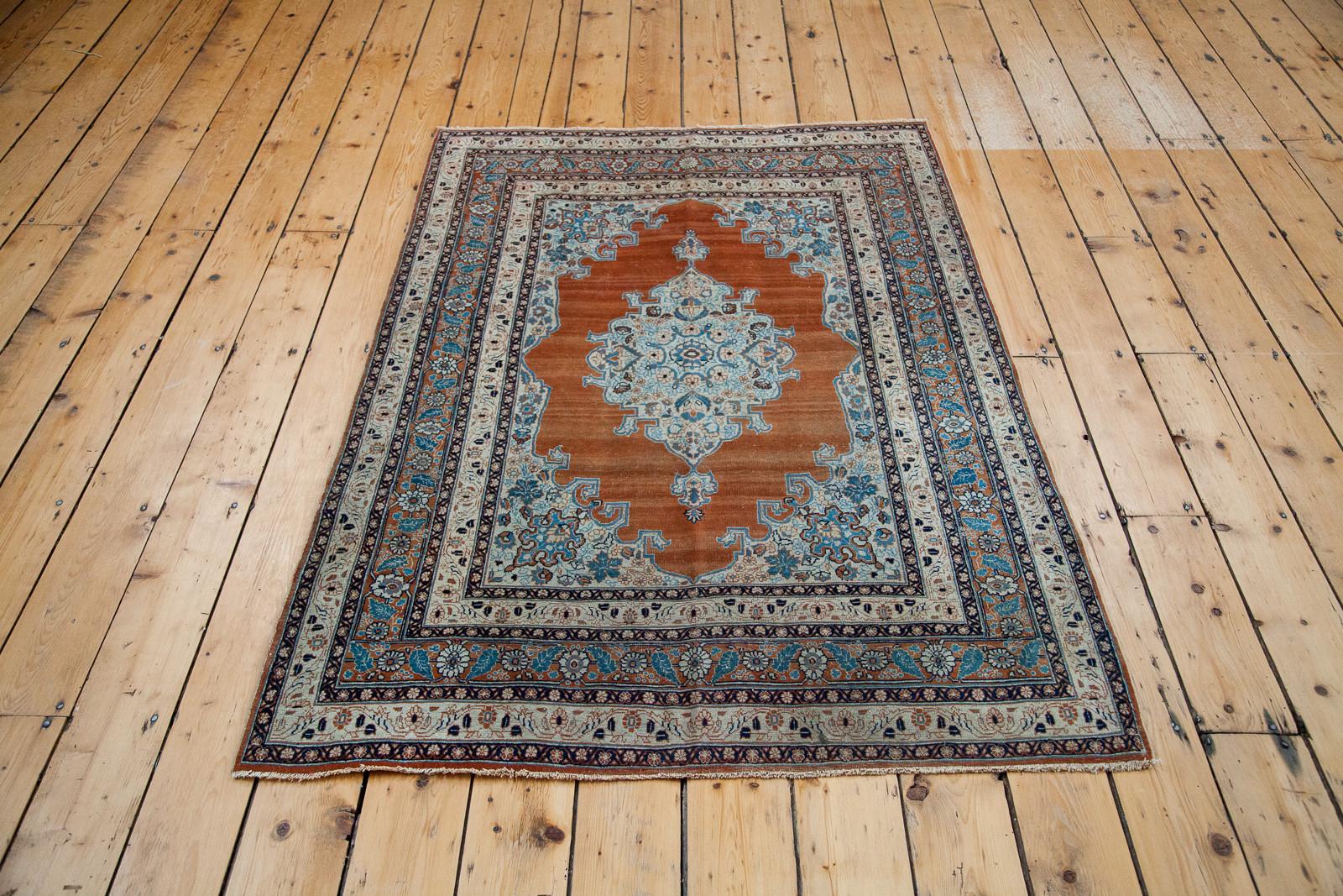 Fine antique Tabriz area rug. Gorgeous rust orange field with wonderful soft saffron and aqua blue highlights throughout. Amazing delicate outlines and intricate details: A prime example of a workshop rug with unique and artistic merit with nuances