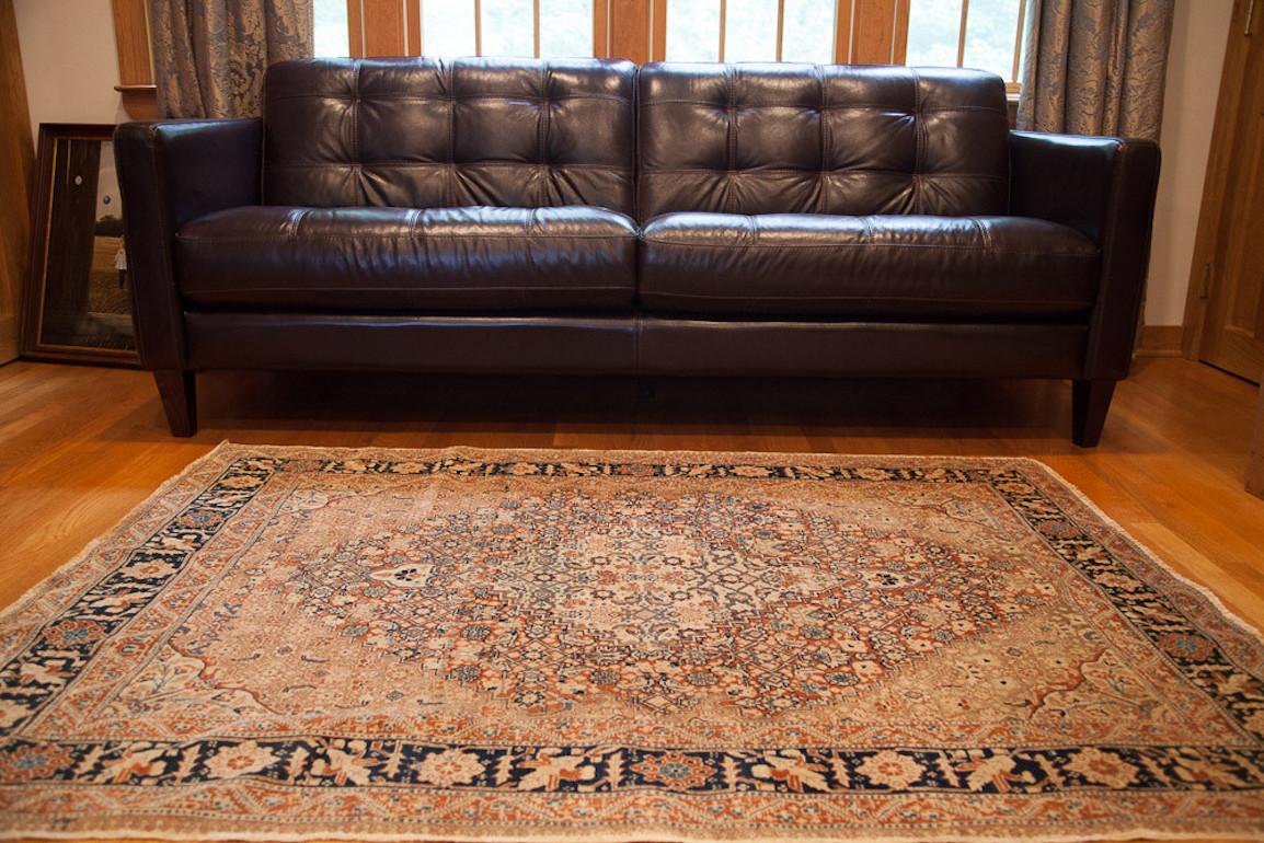 :: One of our personal favorites. Antique Persian Tabriz rug made circa 1910's vintage. Spectacular aesthetic - highly intricate medallion and field softened yet contrasted with a stunning cypress tree border with perfect harmony of positive and