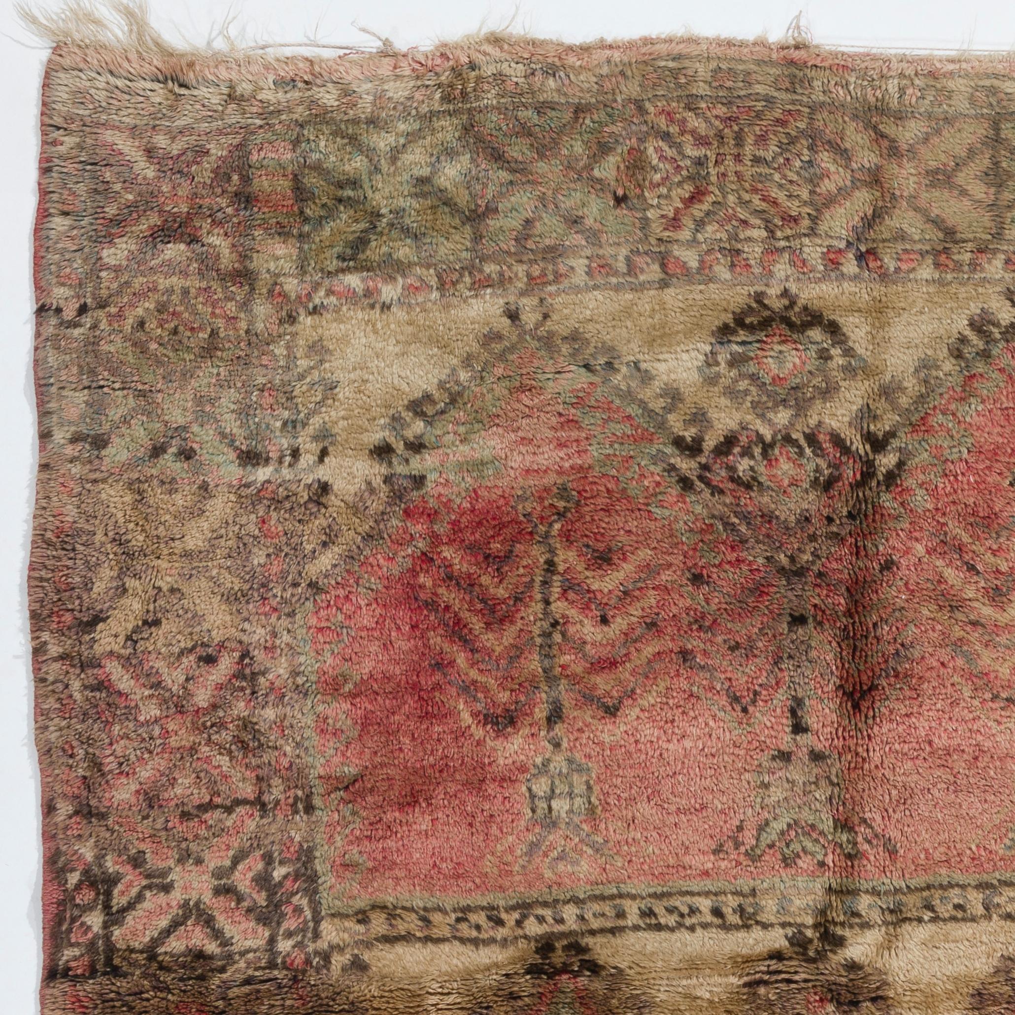 An antique Central Anatolian rug with extraordinary tribal designs and soft plant dyed colors. Finely hand knotted with thick and soft wool pile on wool foundation. Very good condition. Sturdy and professionally washed. 
Size: 4 x 6 ft.