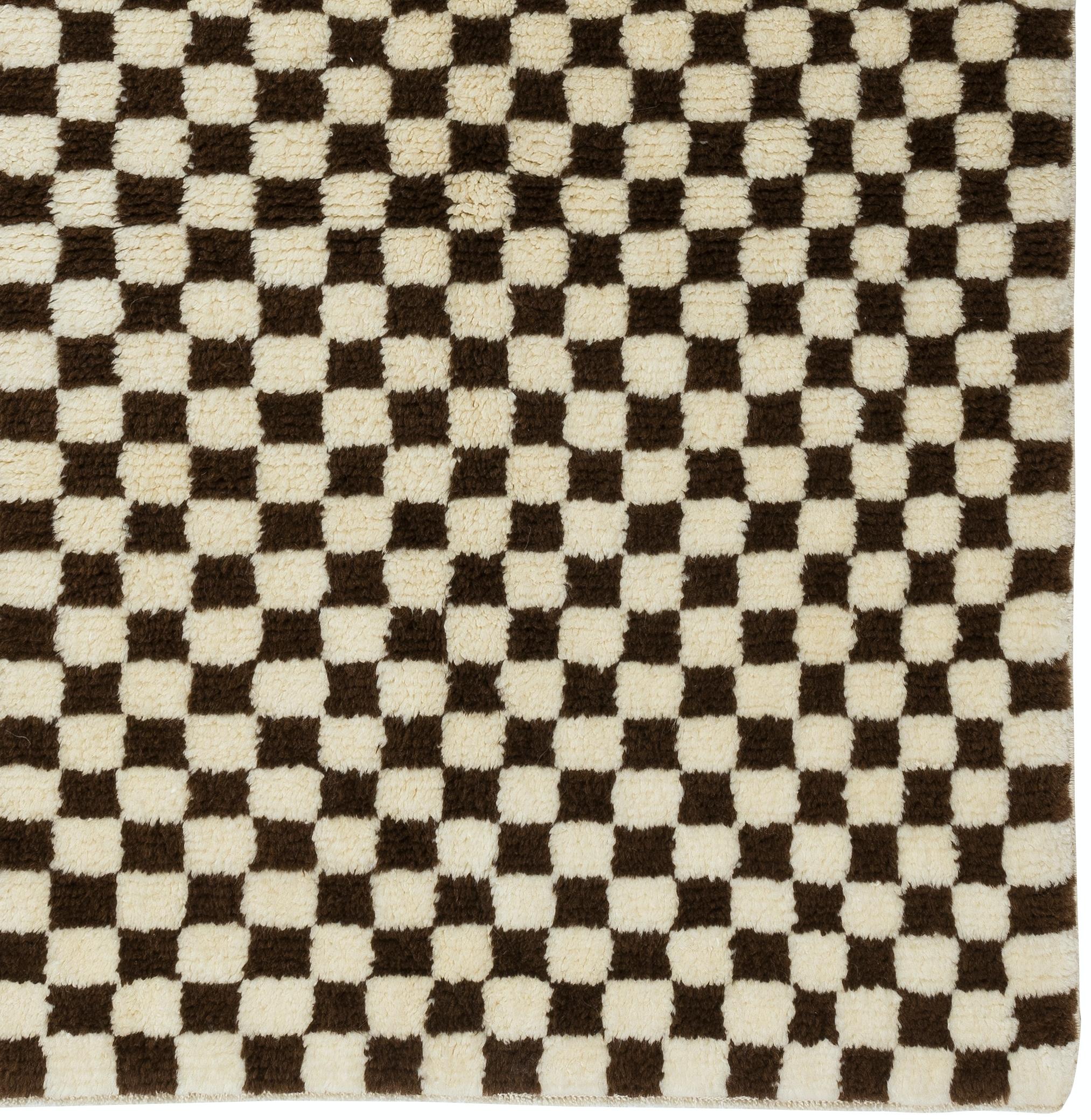 A custom, handmade Tulu rug made from 100% hand-spun wool of finest quality. It features a simple checkered design in cream and radiant brown. Size: 4x6 ft.

Available as seen or can be CUSTOM PRODUCED in any Design, Size, Color Combination and Pile
