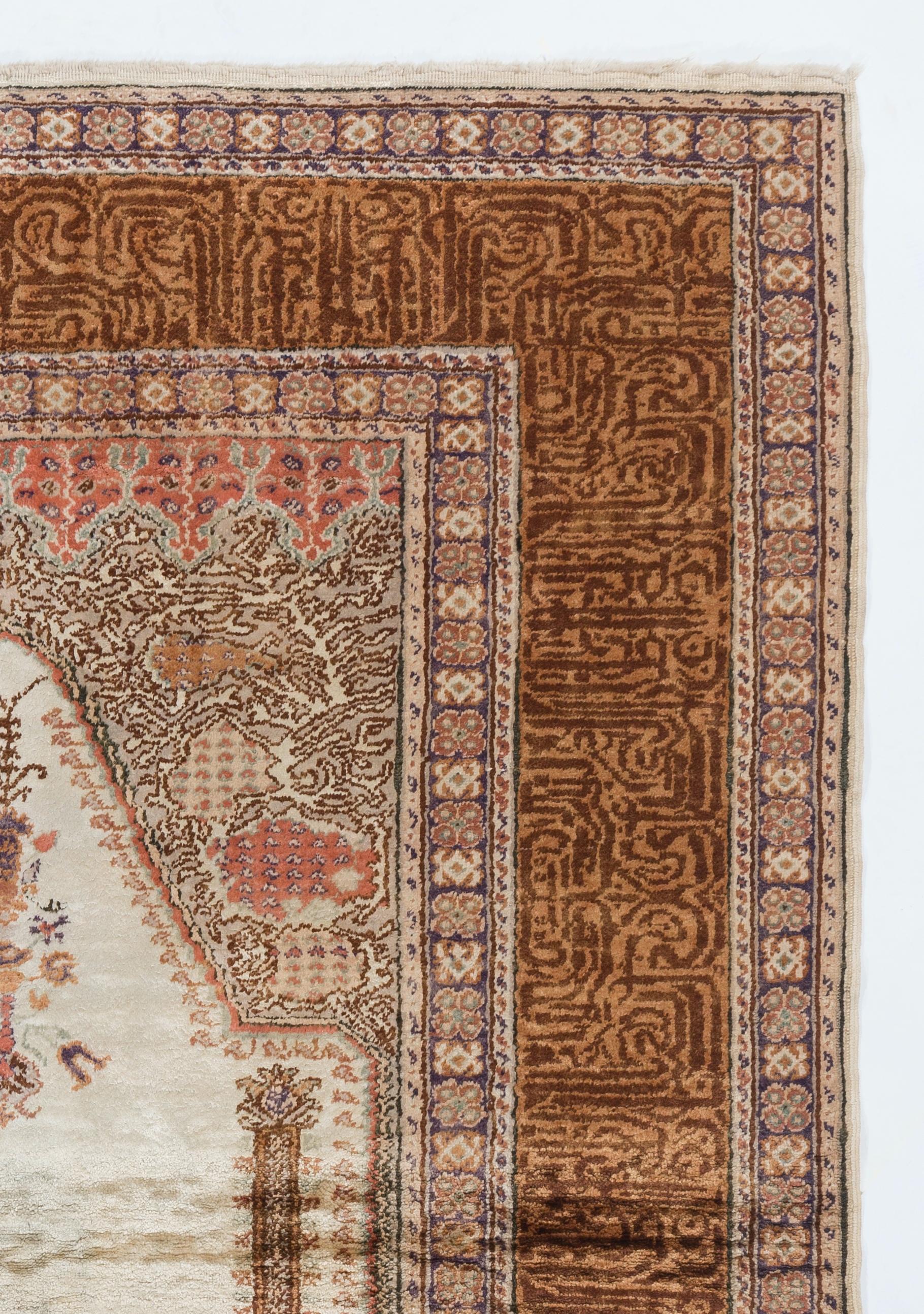 An early 20th century North West Anatolian niche design rug with beautiful colors. Finely hand knotted with even medium art silk pile on cotton foundation. Very good condition. Sturdy and as clean as a brand new rug (deep washed professionally).