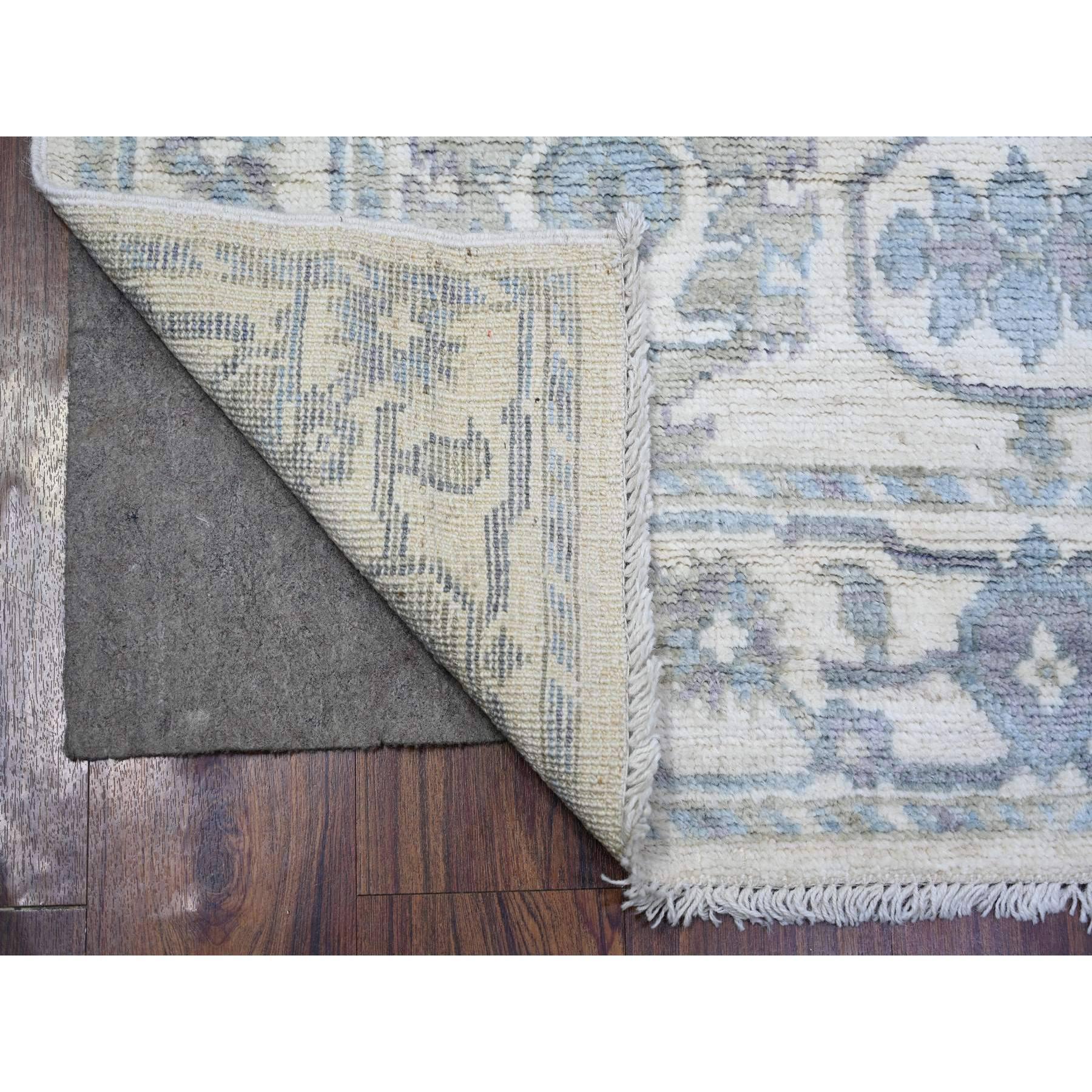 Ivory, Extra Soft Wool Hand Knotted, Afghan Angora Oushak with Soft Colors Natural Dyes, Oriental Rug
Primary materials: Wool
Latex: No Pile 
height: 0.25 Inches
Style: Transitional
Primary color: Ivory
Secondary colors: Gray, Light Blue
Pattern: