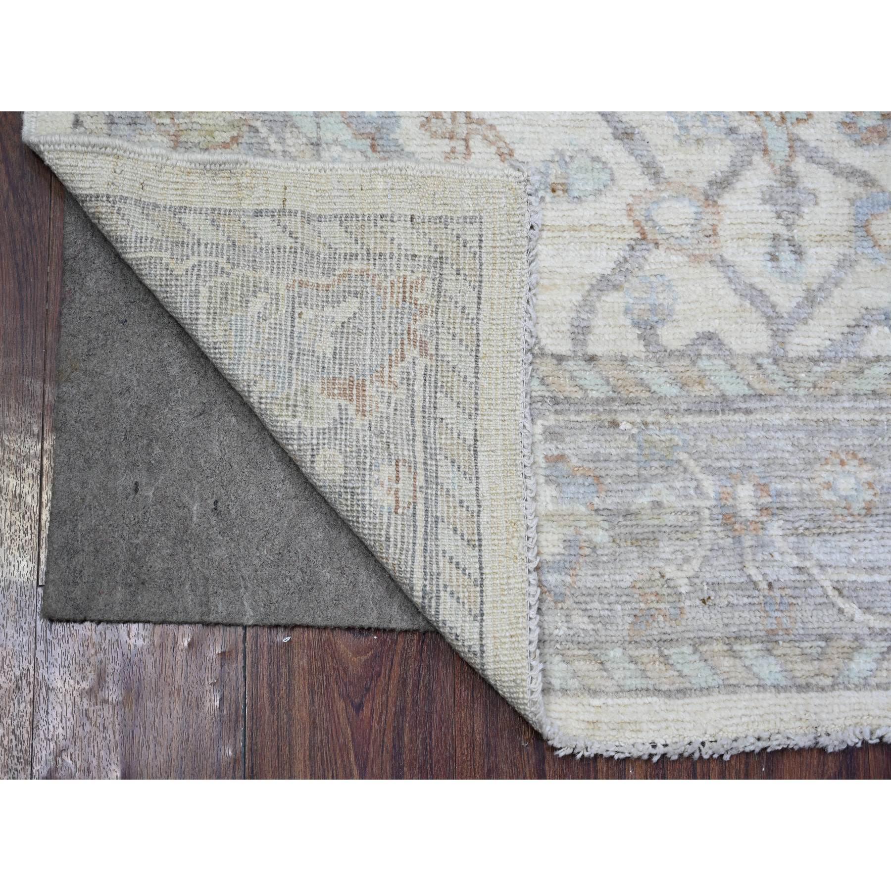 Cream Color, Afghan Angora Oushak with All Over Vines Design Natural Dyes, 100% Wool Hand Knotted, Oriental Rug
Primary materials: Wool
Latex: No Pile 
height: 0.25 Inches
Style: Transitional
Primary color: Beige
Secondary colors: Light Blue, Ivory,