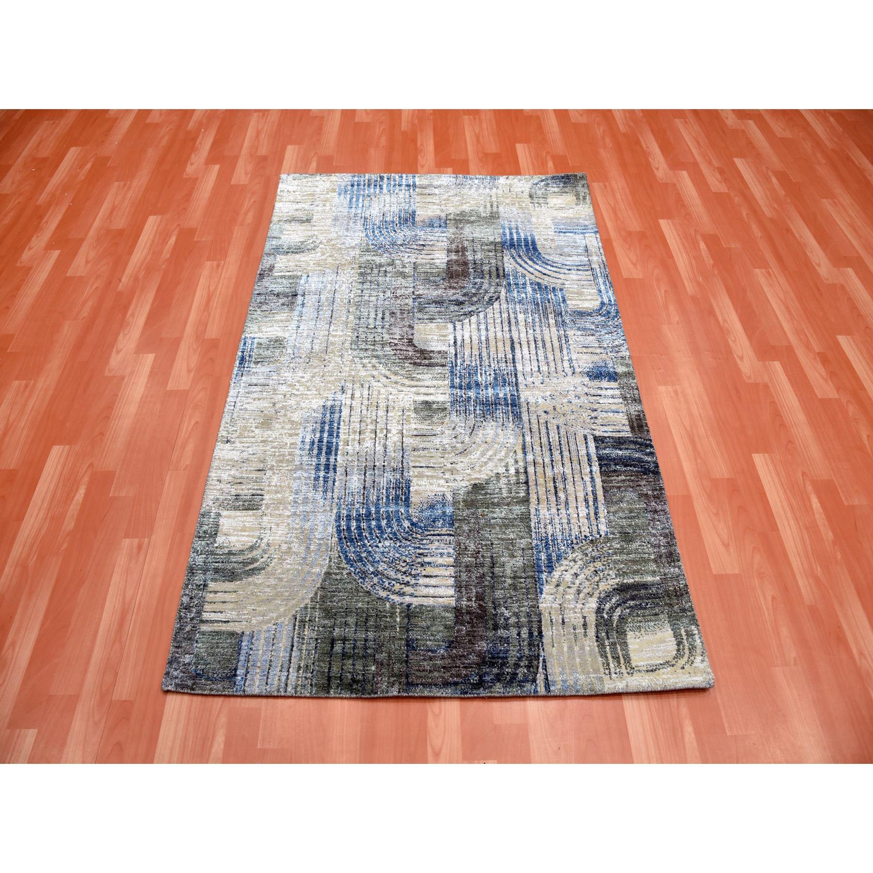THE INTERTWINED PASSAGE, Silk with Textured Wool, Hand Knotted Oriental Rug
Primary materials: Wool & Silk
Latex: No Pile 
height: 0.25 Inches
Style: Transitional
Primary color: Blue
Secondary colors: Ivory, Beige, Green, Navy Blue, Brown,