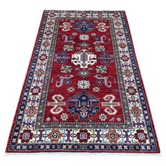Alfombra oriental de lana pura «Super Kazak» tejida a mano, de 122 x 189 cm, color rojo baya