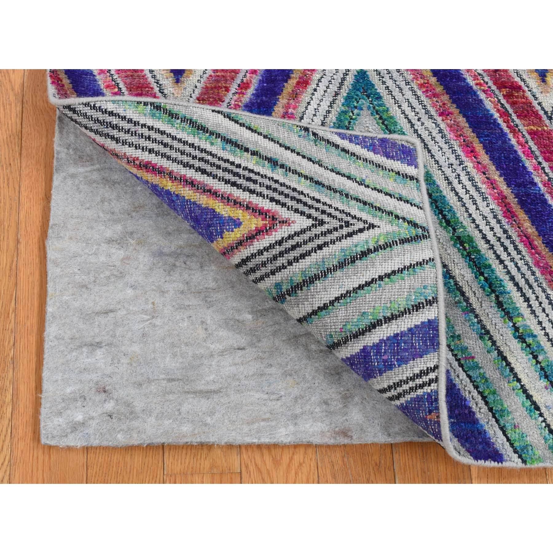 Hot Pink, Hand Knotted, Chevron Design, Sari Silk with Textured Wool, Oriental Rug
Primary materials: Wool & Silk
Latex: No Pile 
height: 0.25 Inches
Style: Transitional
Primary color: Pink
Secondary colors: Gray, Black, Blue, Purple, Ivory, Green,