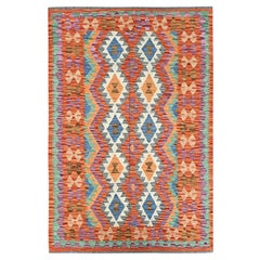 4'x6'3" Arancione Vivace Tessuto a mano a trama piatta Rug & Kilim geometrico afgano tutto in lana