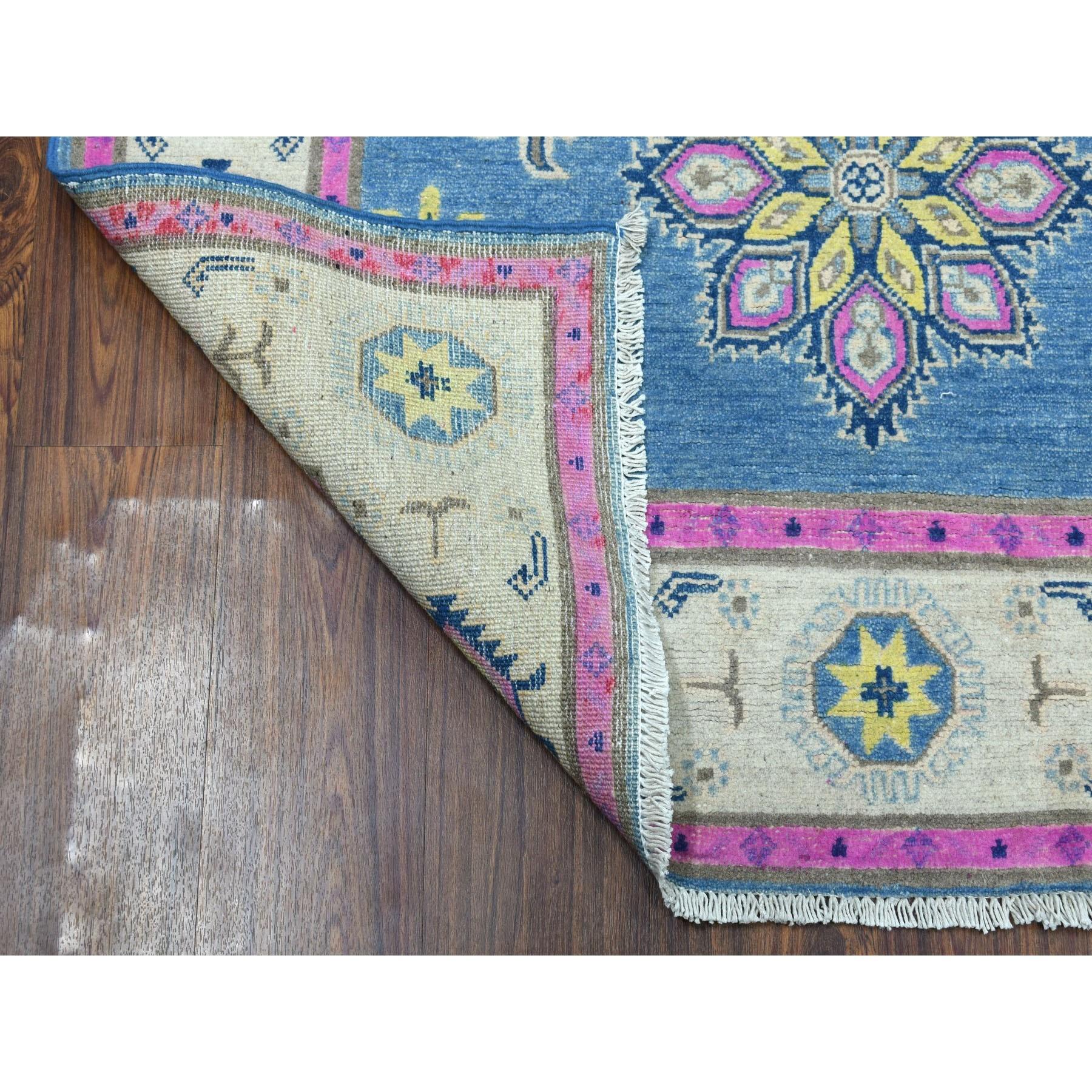 This is a truly genuine one-of-a-kind Colorful Blue Fusion Kazak Pure Wool Hand Knotted Oriental Rug. It has been Knotted for months and months in the centuries-old Persian weaving craftsmanship techniques by expert artisans.
Primary materials: