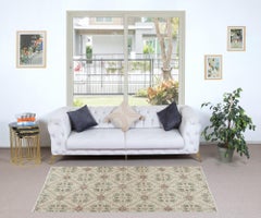 4x6.8 Ft Handknotted Vintage Rug with Beige Background and Green Floral Pattern