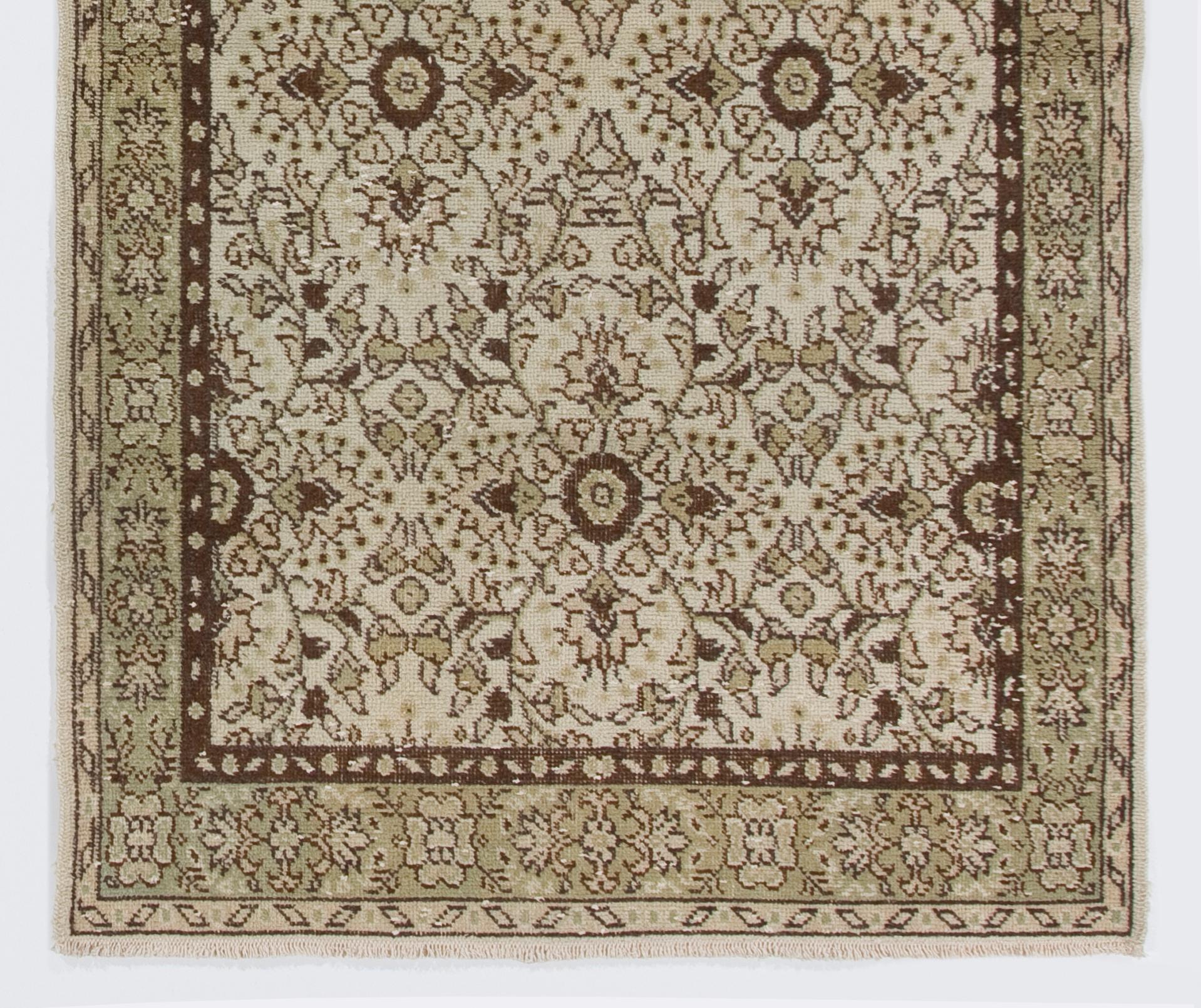A vintage Turkish accent rug. Finely hand-knotted with even medium wool pile on cotton foundation. Very good condition. Sturdy and as clean as a brand new rug (deep washed professionally).
 
