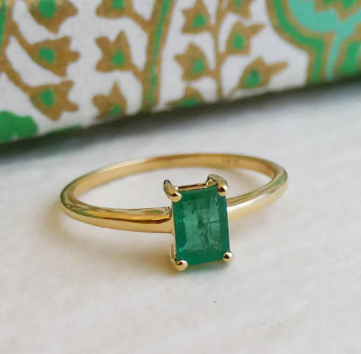 4x6mm emerald is prong set in 14kt yellow gold. Band is 1.1mm. Gold weight is 1.65 grams.
Available in sizes: 6 and 7
Please let me know what size you want when you order.