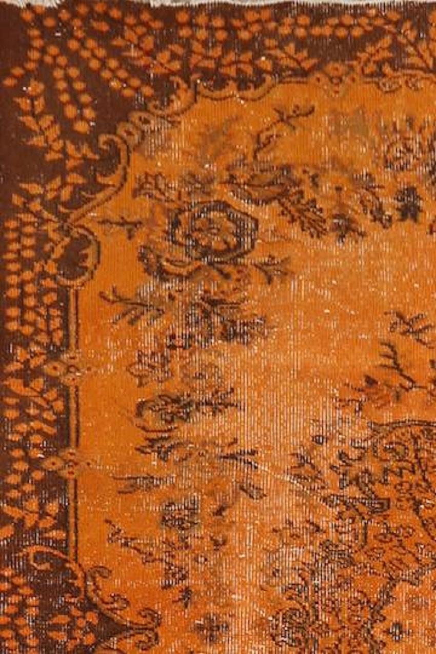 A vintage Turkish accent rug re-dyed in orange color for contemporary interiors. Measures: 4 x 7 Ft.
Finely hand knotted, low wool pile on cotton foundation. Professionally washed.
Sturdy and can be used on a high traffic area, suitable for both