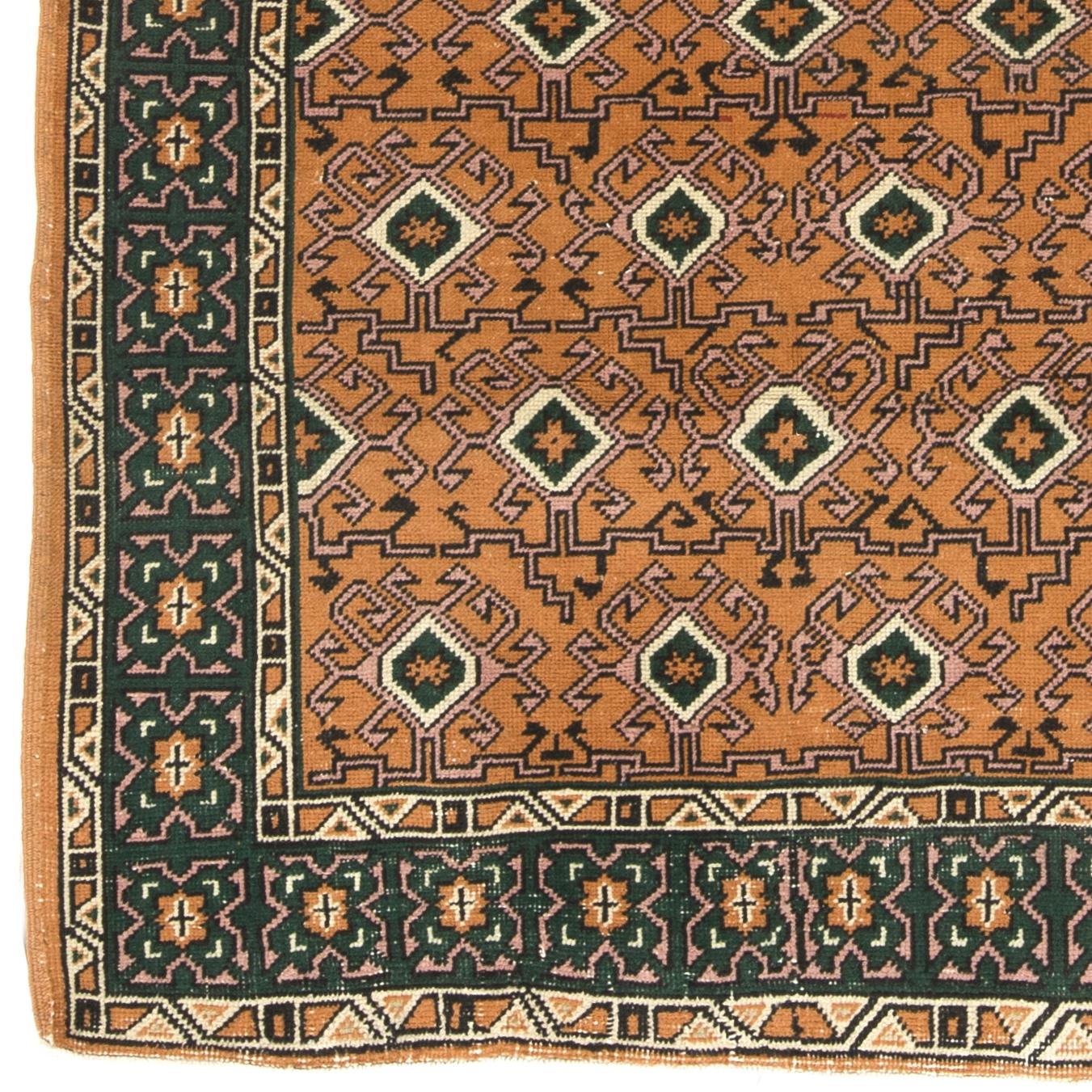 Infuse your home with the timeless beauty of this traditional vintage handmade Turkish rug, a hand-knotted masterpiece crafted from a luxurious blend of wool and cotton. Woven by skilled artisans using centuries-old techniques, this rug features